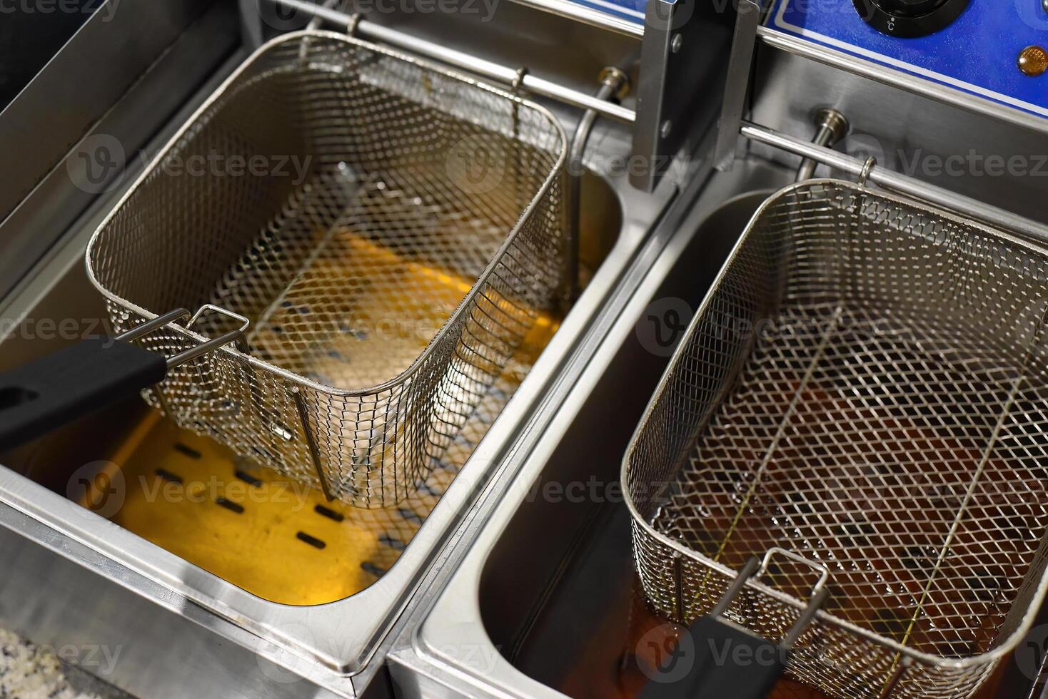 Equipment for deep frying in oil for tacos in a mexican restaurant photo