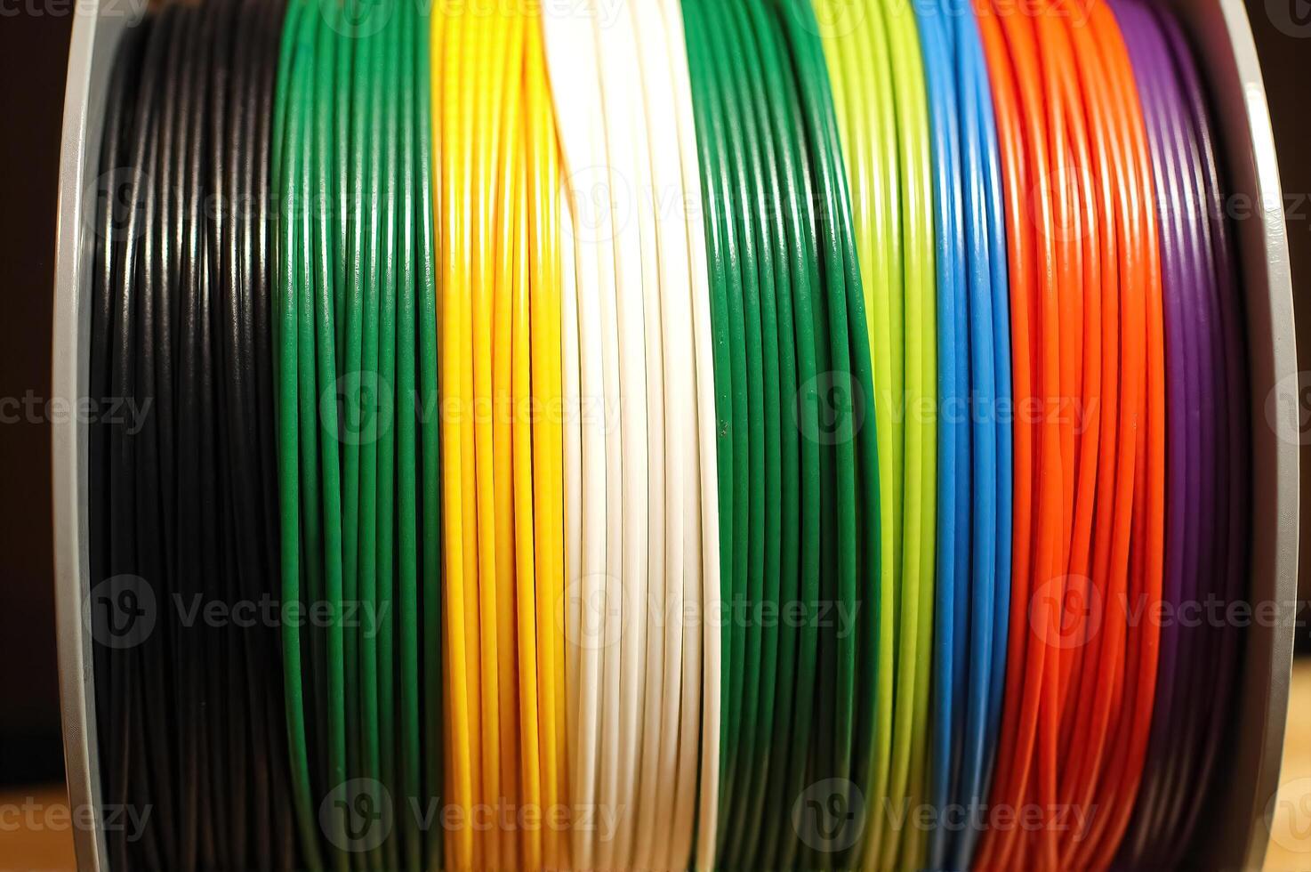 Vibrant Collection of Colorful 3D Printing Filament Spools Ready for Creative Projects photo