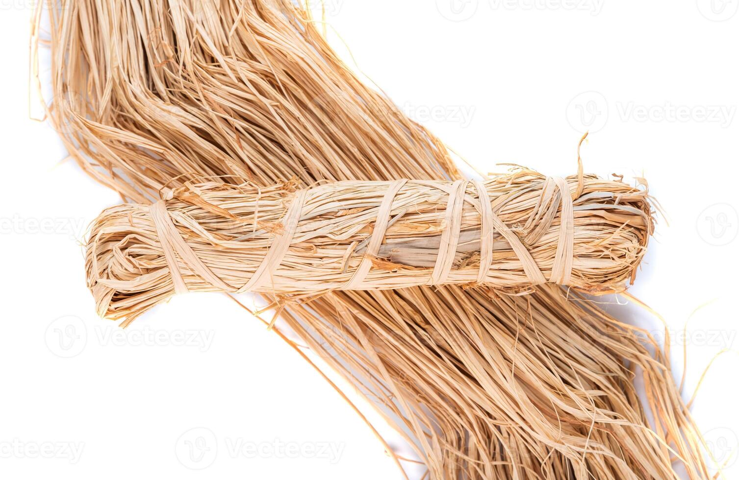 Raphia skein natural color on white background photo