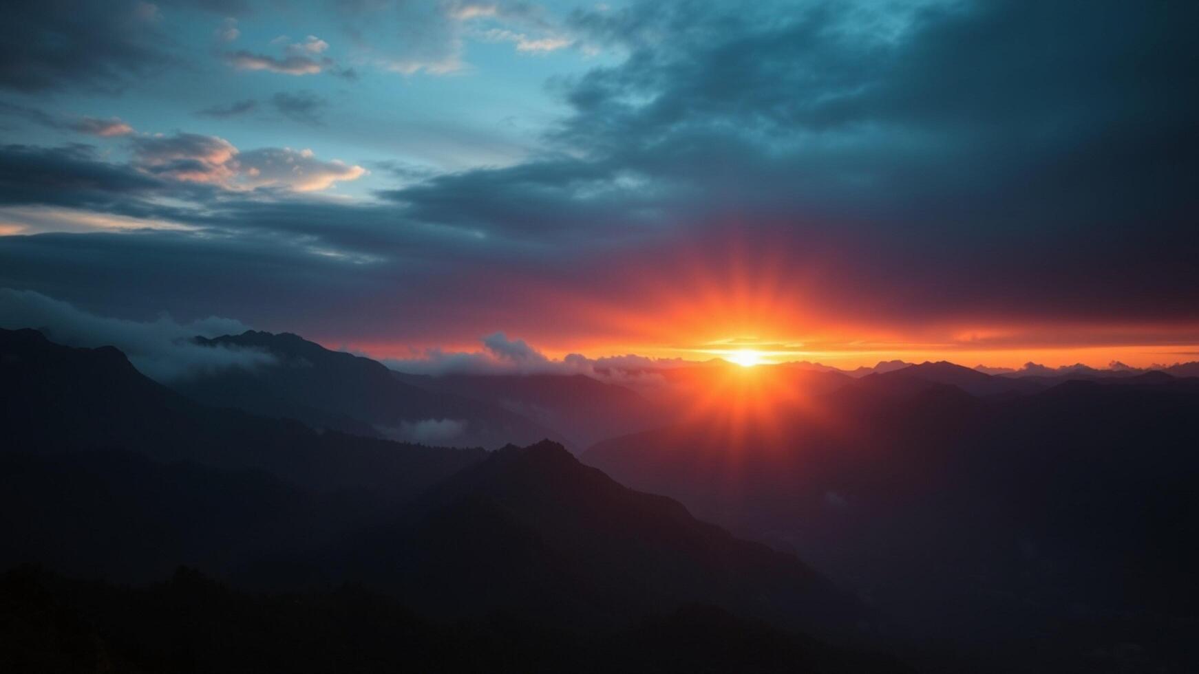 The sun is setting over a mountain range photo