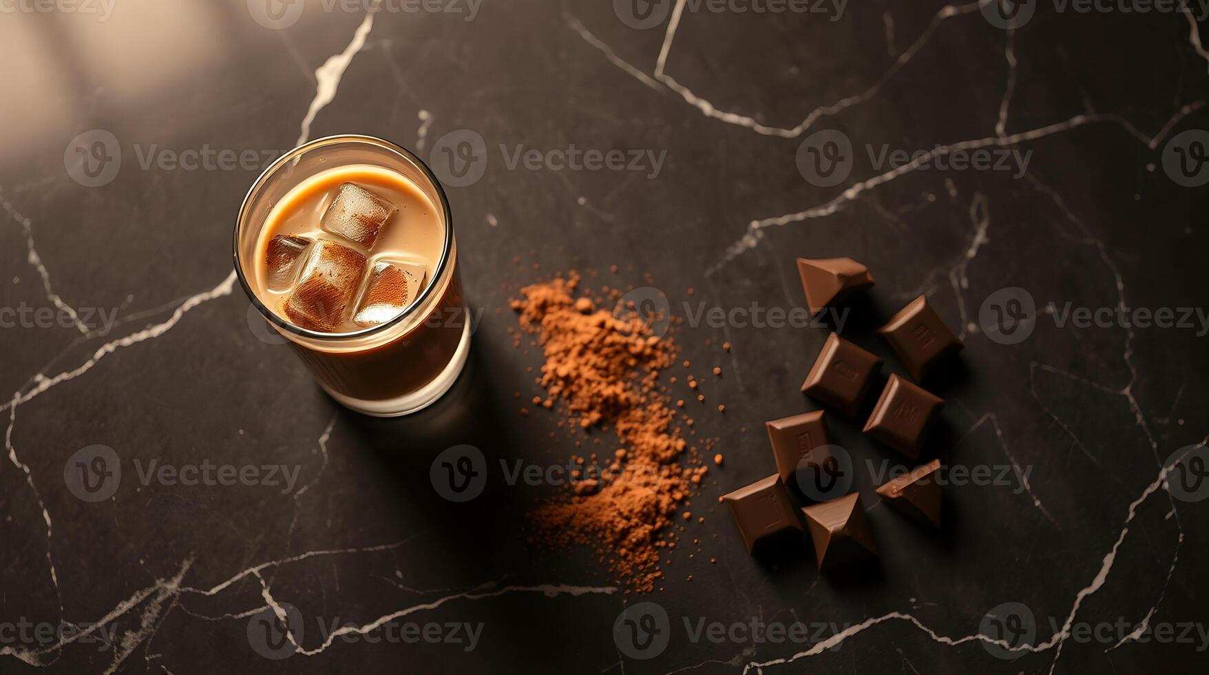 A glass of coffee with ice cubes and chocolate photo