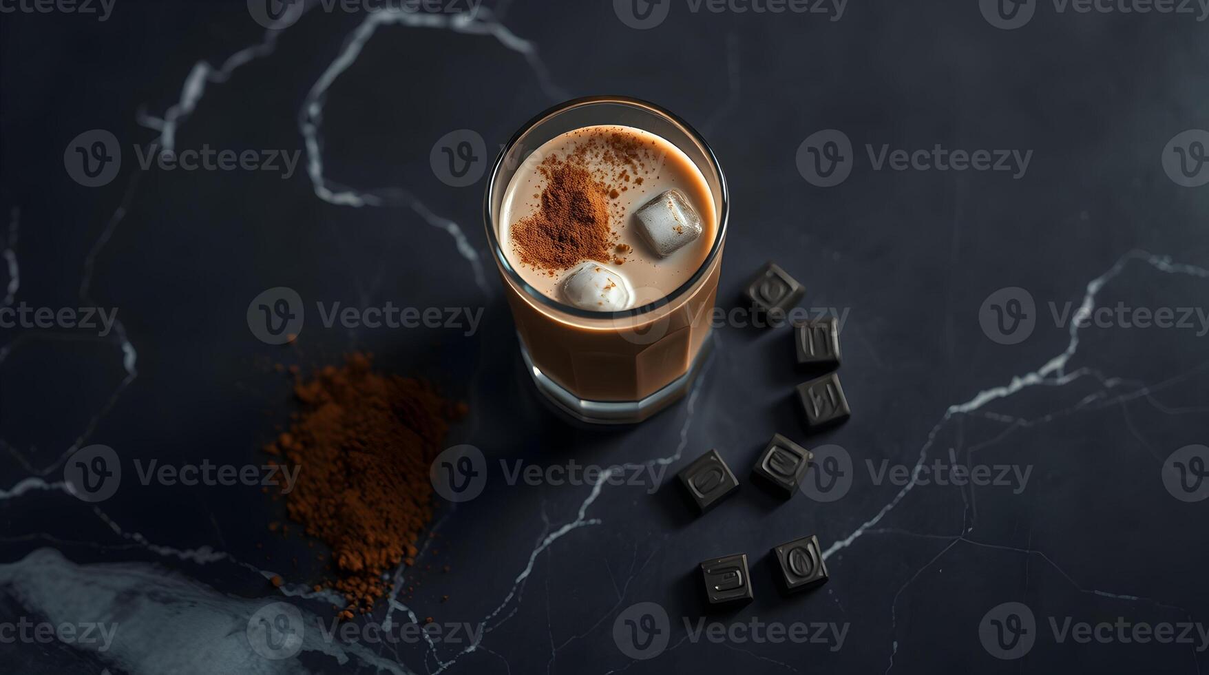 A glass of coffee with marshmallows and chocolate photo