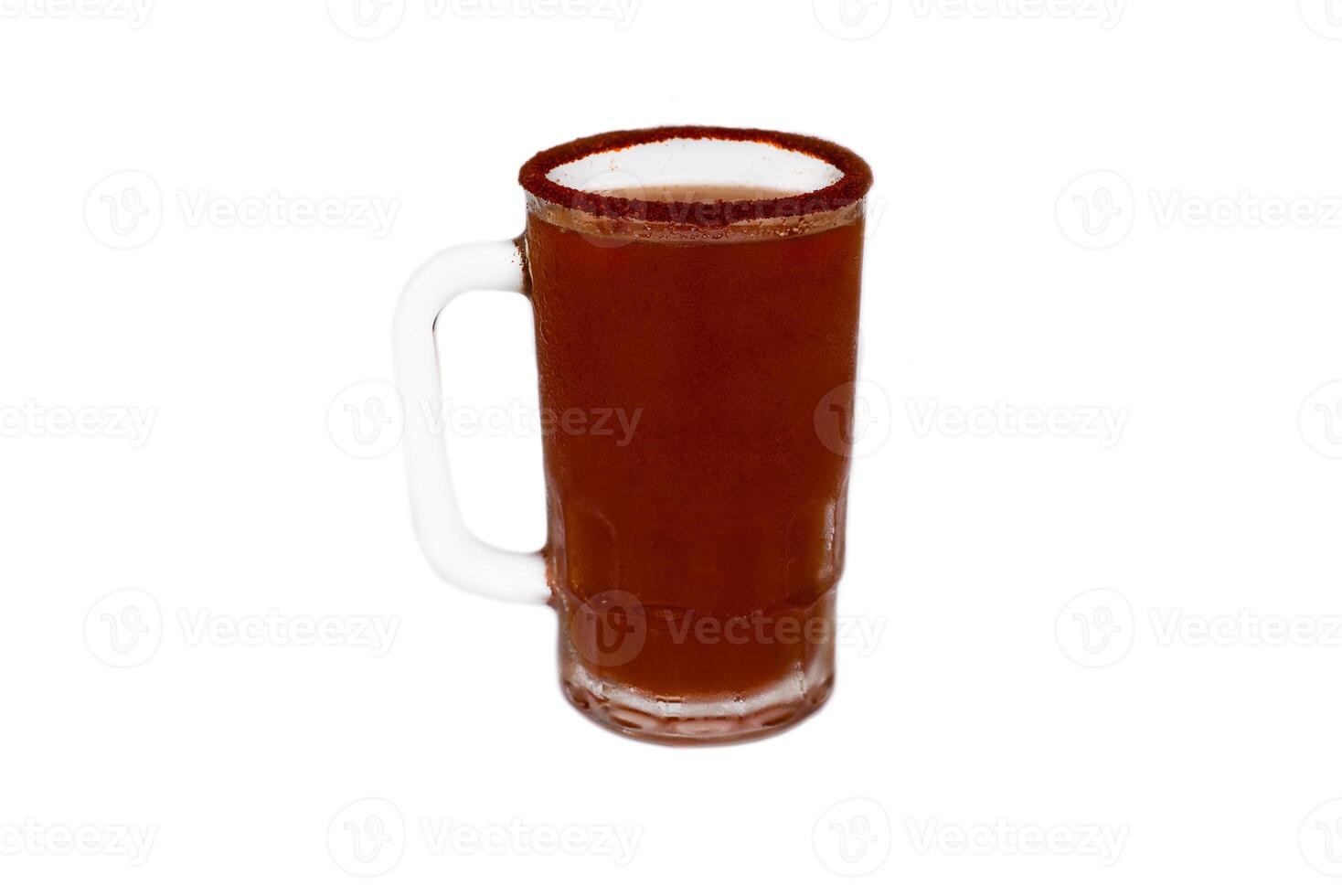Mexican drink Cerveza roja with pepper isolated on white background photo