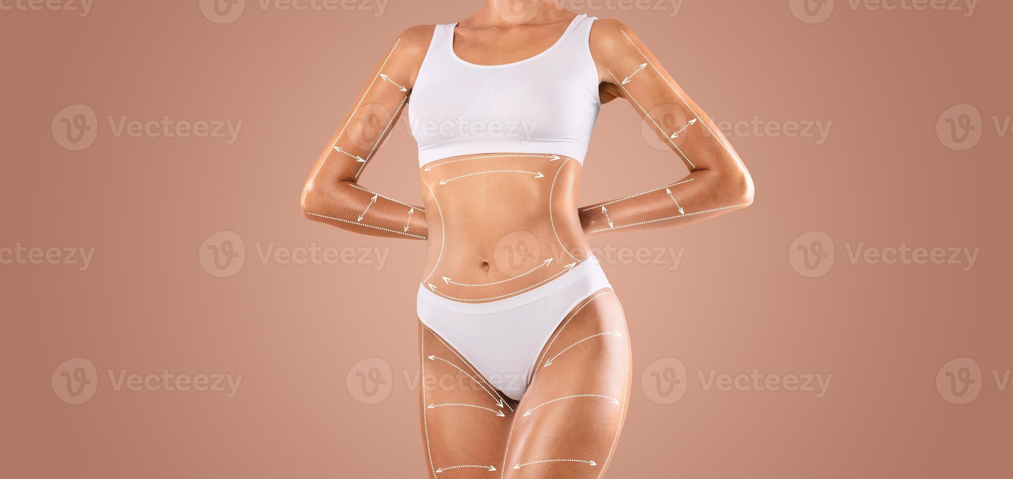 A woman engages in body sculpting and contouring, focusing on skin pampering and weight loss. This activity emphasizes feminine curves in a serene setting with blank space for text. photo