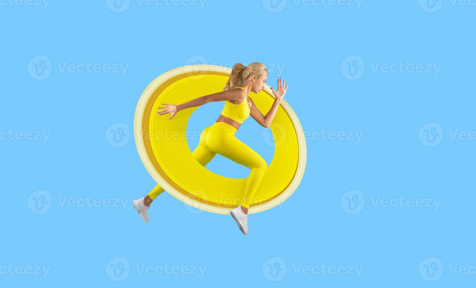 Running Competition. Confident young woman in yellow sportswear jogging and jumping looking at copy space. Lady sprinting isolated on blue studio background, panorama banner, mockup, side view profile photo