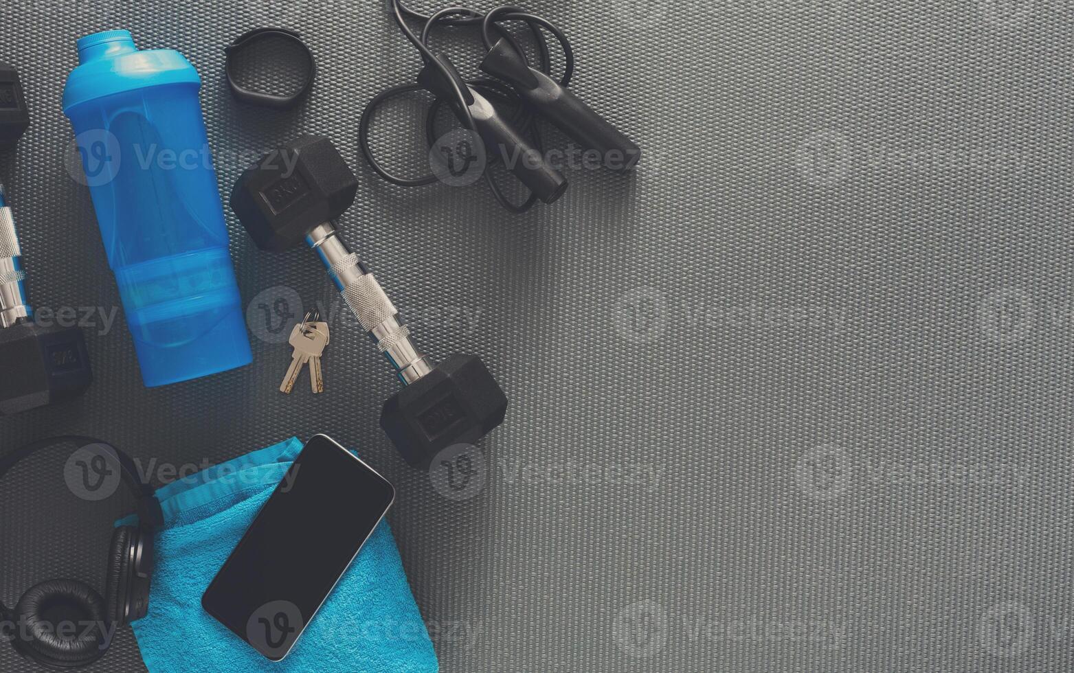 Fitness background, blue sport equipment for training, copy space, top view. Weightloss, healthy lifestyle concept photo