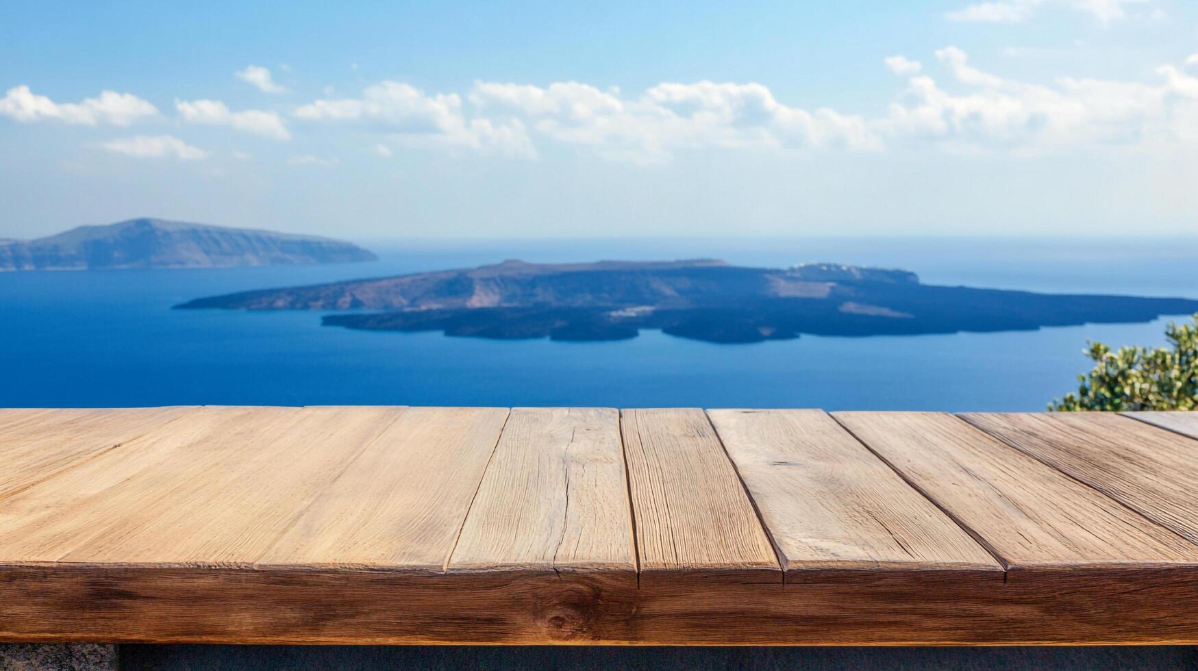 Wooden surface overlooking a serene blue sea with distant islands under a partly cloudy sky, perfect for displaying products or concepts. photo