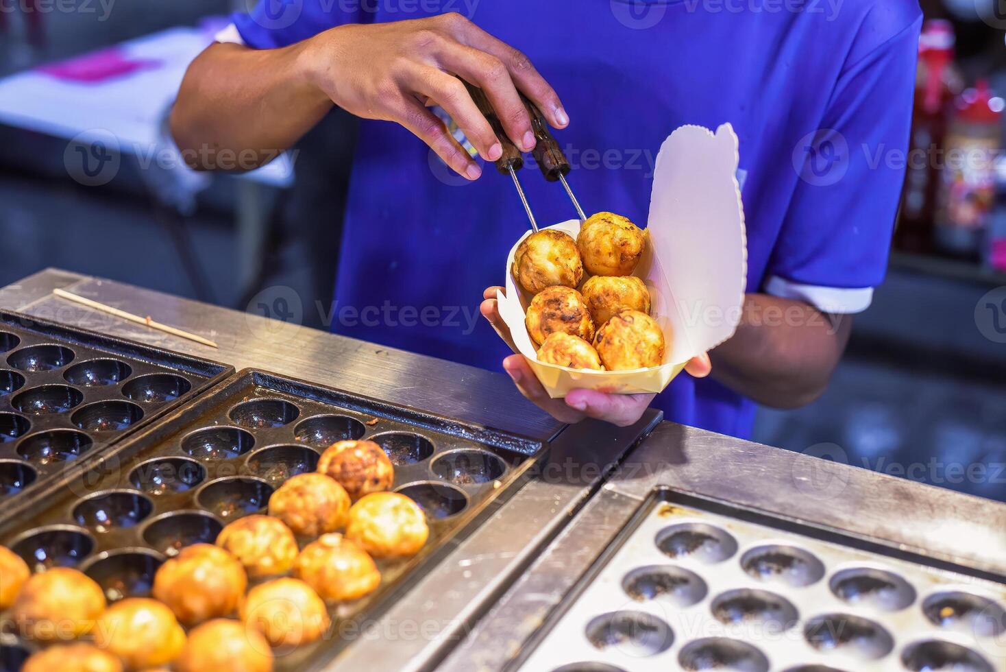 Takoyaki ball in Jalan Alor street food in Kuala Lumpur photo