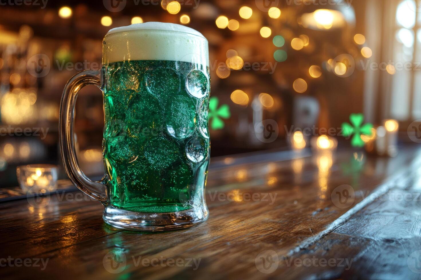 Green beer celebrating Saint Patrick's Day sitting on a wooden bar counter photo