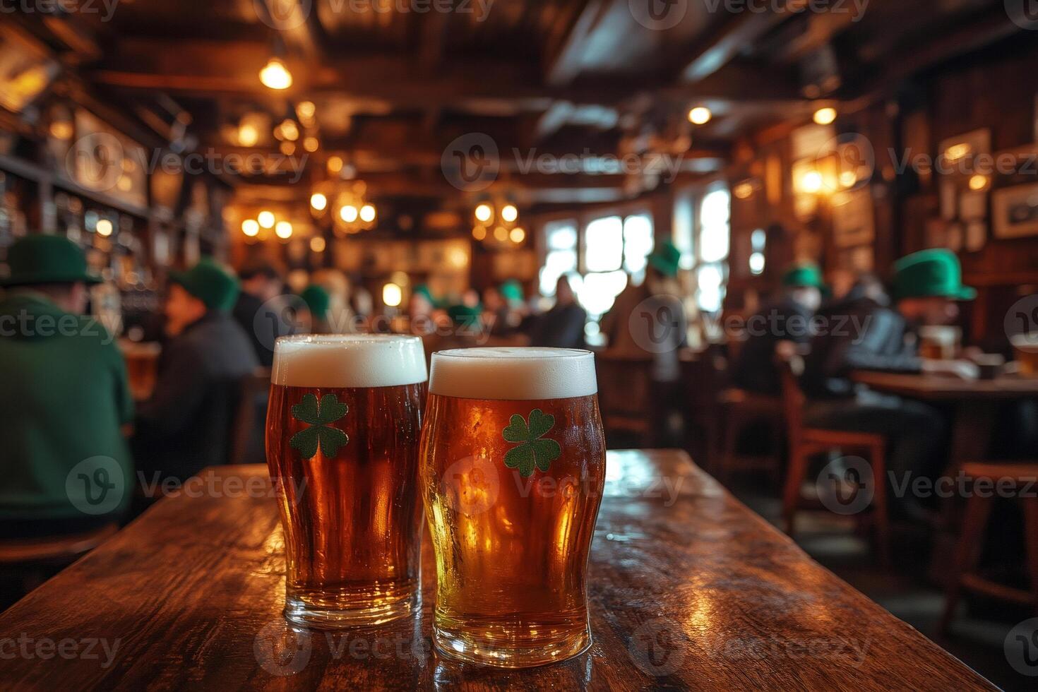 Two glasses of beer with shamrock celebrating Saint Patrick's Day in a crowded pub photo