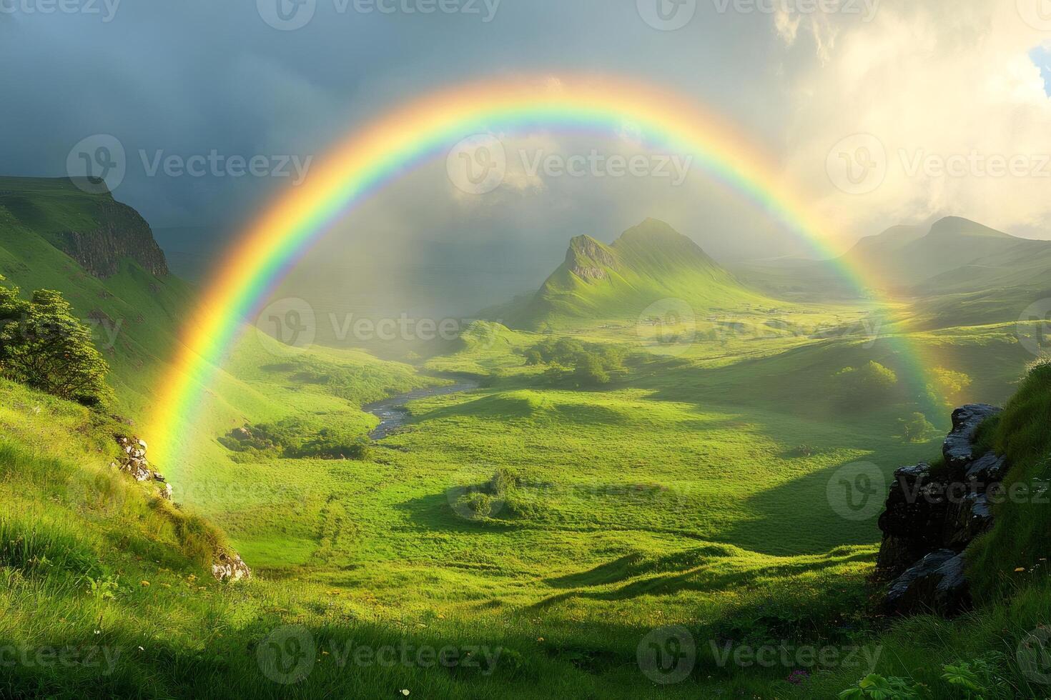 Bright rainbow embracing green valley in the Isle of Skye, Scotland photo