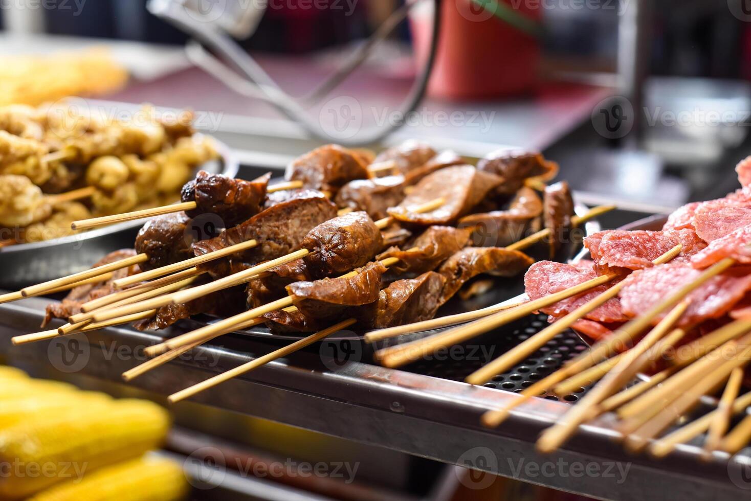 Grilled sausages and salami bbq in Jalan Alor street food in Kuala Lumpur photo