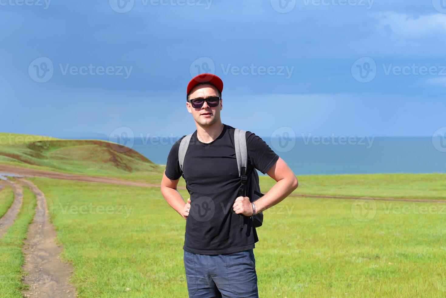 Russian tourist on the path of the Cape Kharantsy in Olkhon island, Russia photo