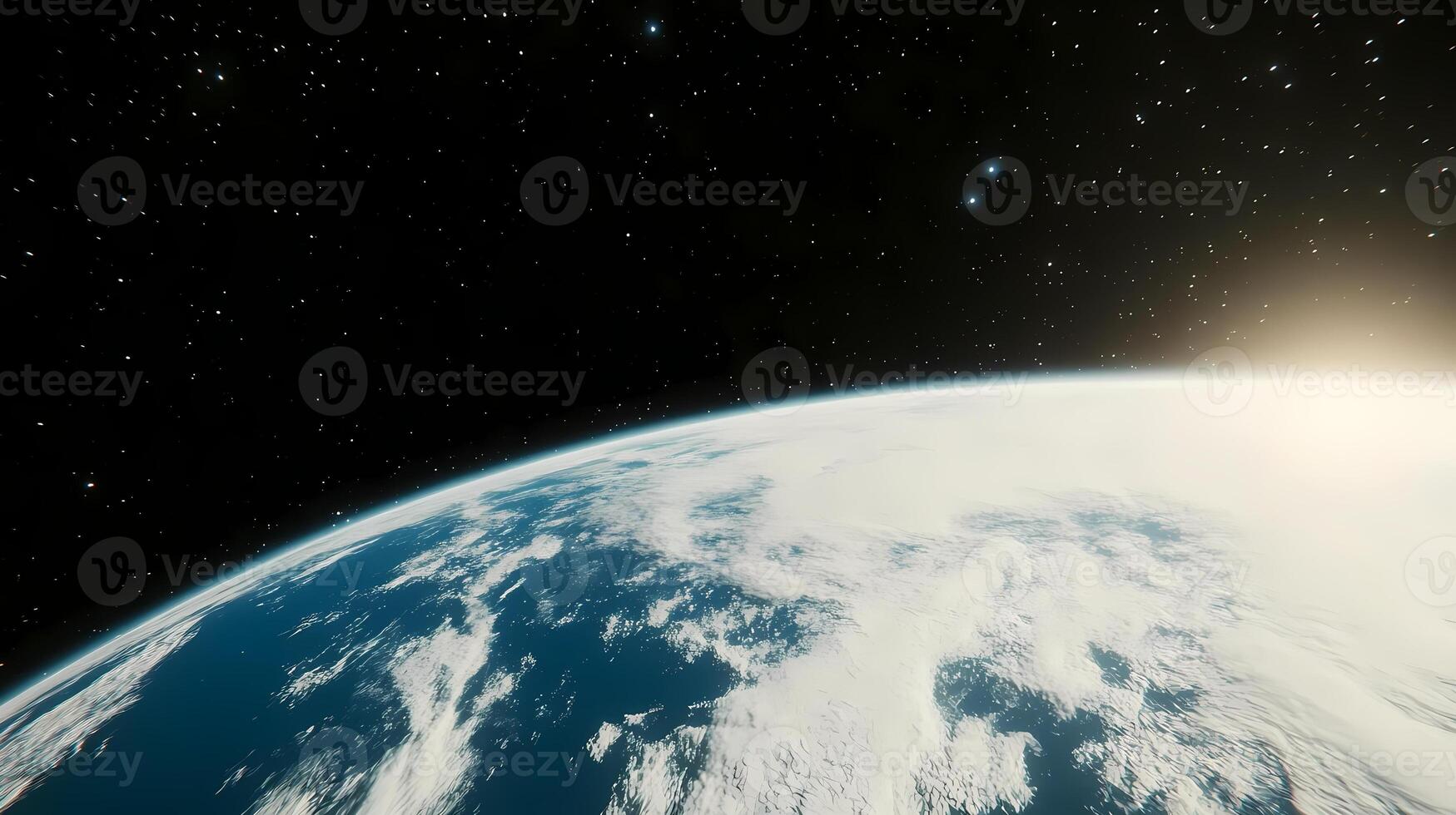 Planet earth rotating in space with sun rising from horizon photo