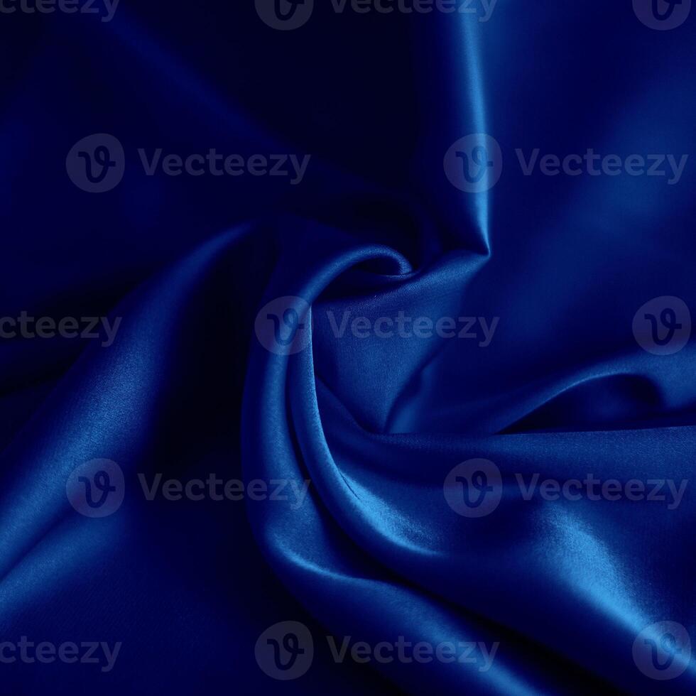 photo of blue silk fabric template of fabric roll of fabric