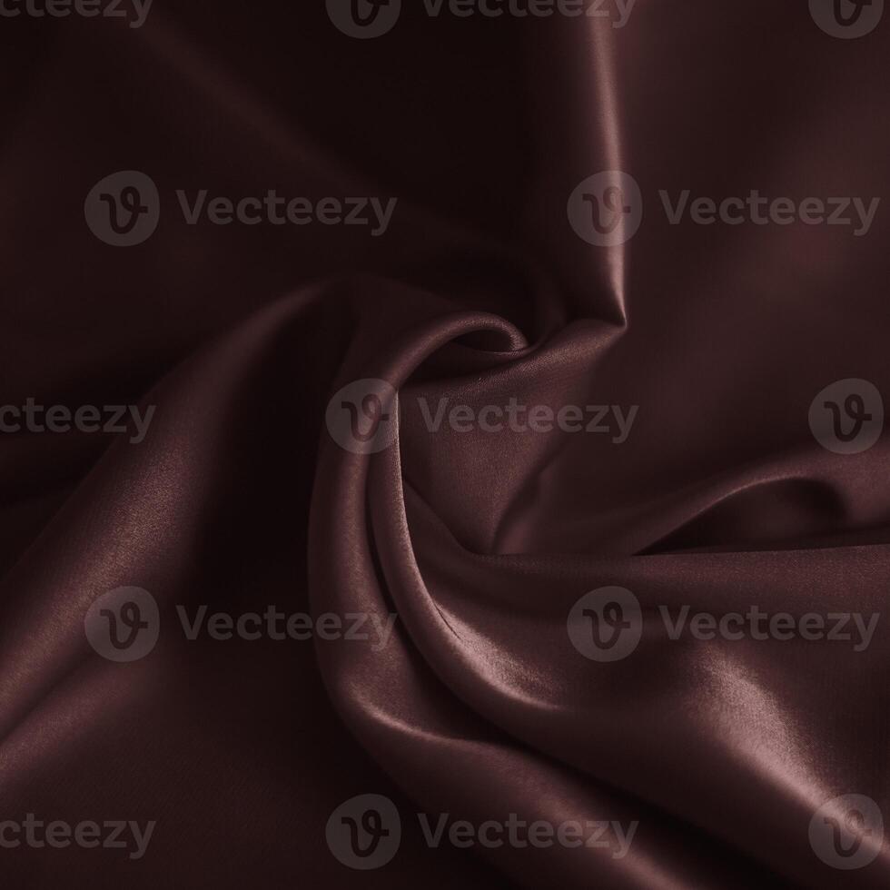 photo of chocolate silk fabric template of fabric roll of fabric