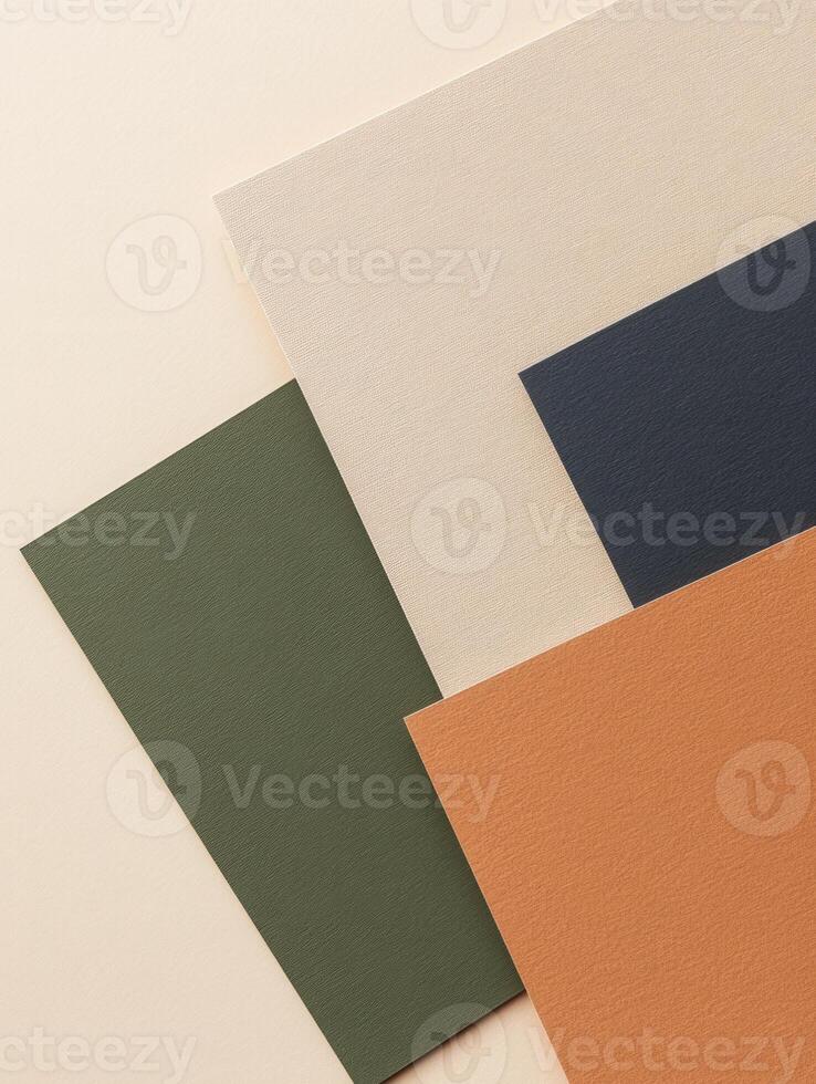 Arrangement of textured paper sheets in complementary earthy tones, showcasing color harmony photo