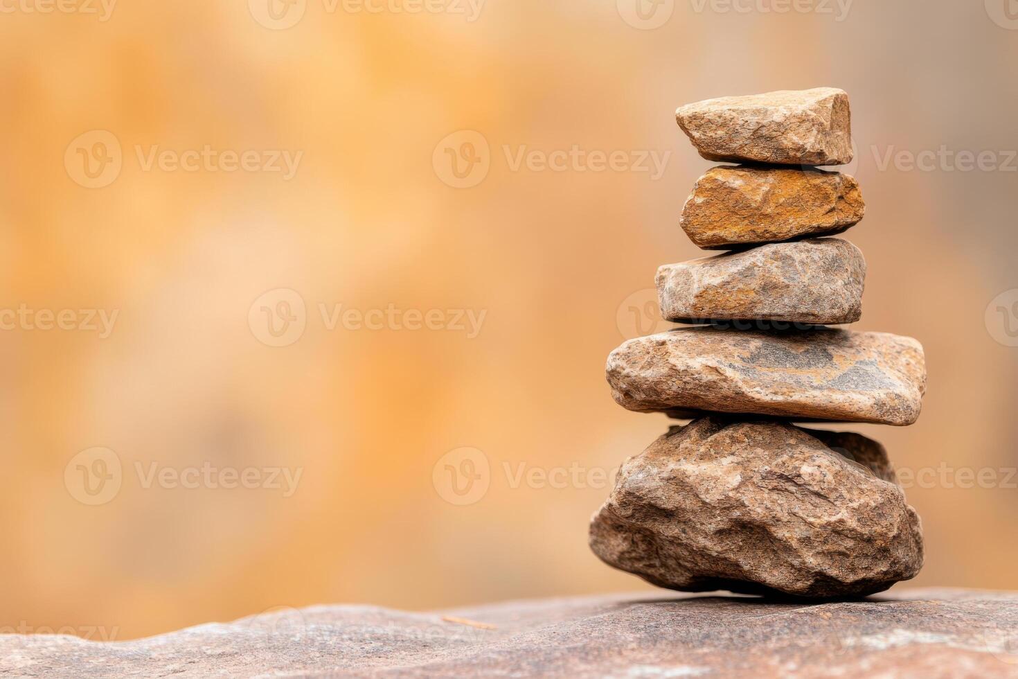 Stacked Stones, Balanced natural stones create a calming zen-like structure on a soft background photo