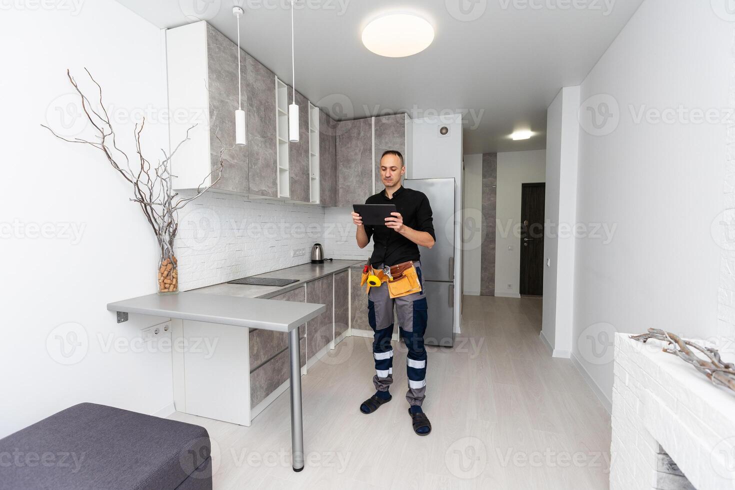 Man using smart home security system control panel photo