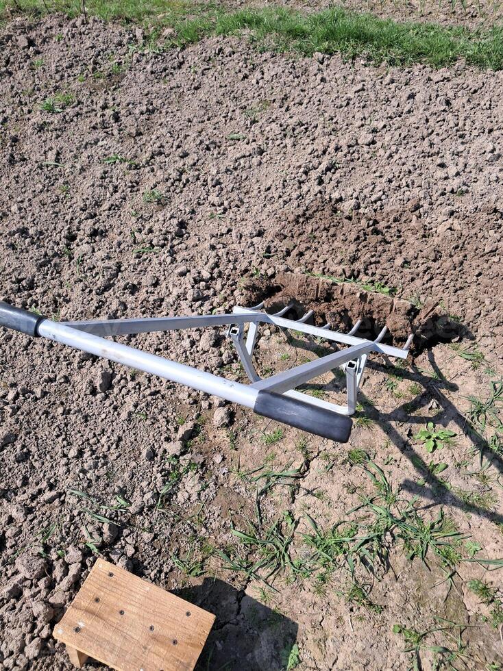Hand shovel for digging and loosening the garden photo