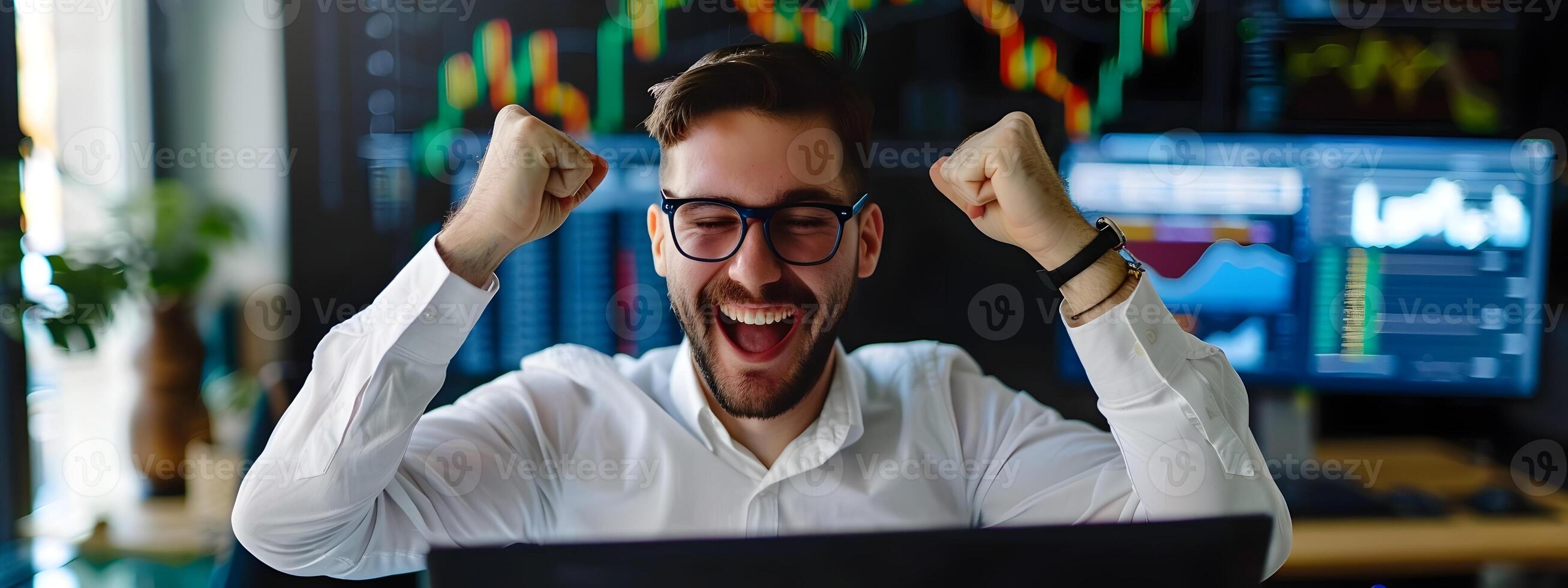 Business Analyst Celebrating Successful Completion of Project on Laptop in Modern Office Workspace photo