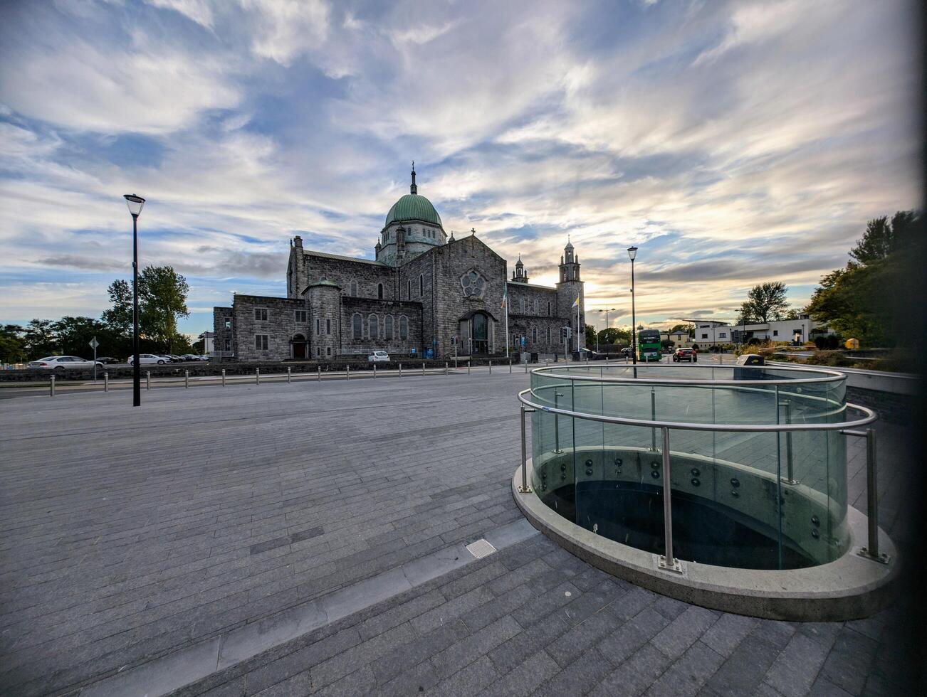 Galway cathedral under dramatic cloudy sunset skies in Galway city, Ireland, Irish landmark, buildings and architecture photo