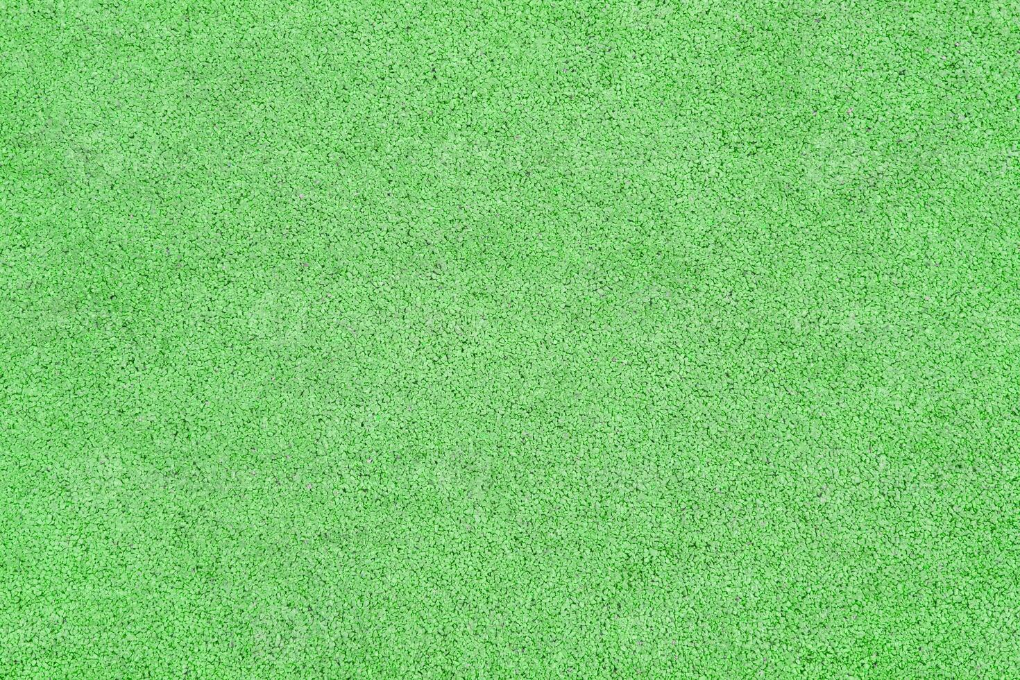 Green rubber crumb surface as texture, background photo