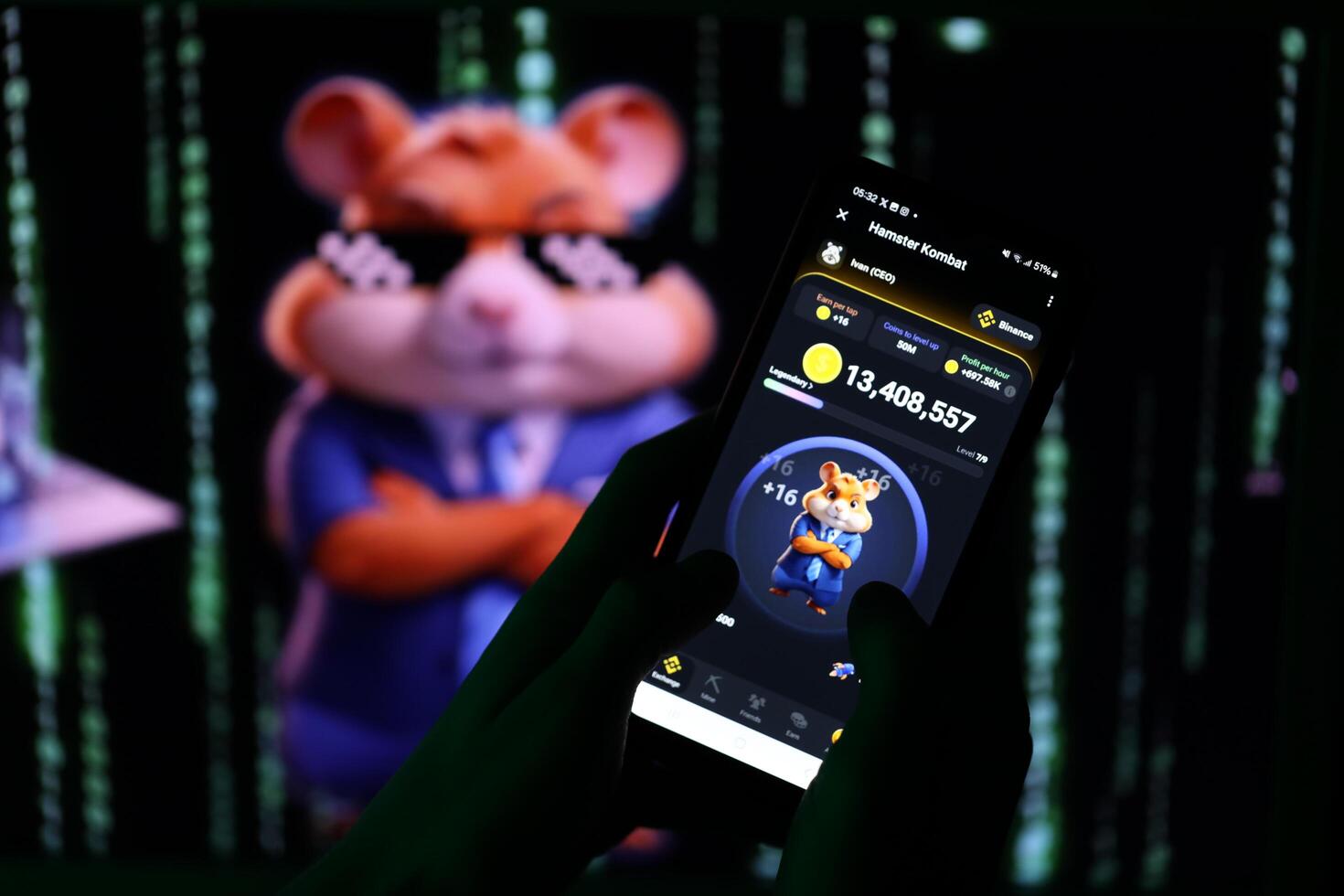 KYIV, UKRAINE - APRIL 20, 2024 Hamster Kombat telegram bot on smartphone screen. Hamster Kombat is a viral Telegram-based crypto game for earn HMSTR tokens by managing virtual crypto exchange photo