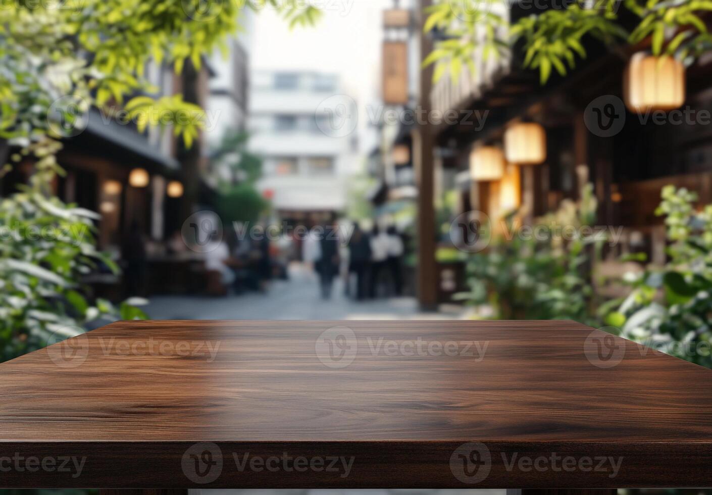 A wooden table in a vibrant outdoor setting with blurred background. photo