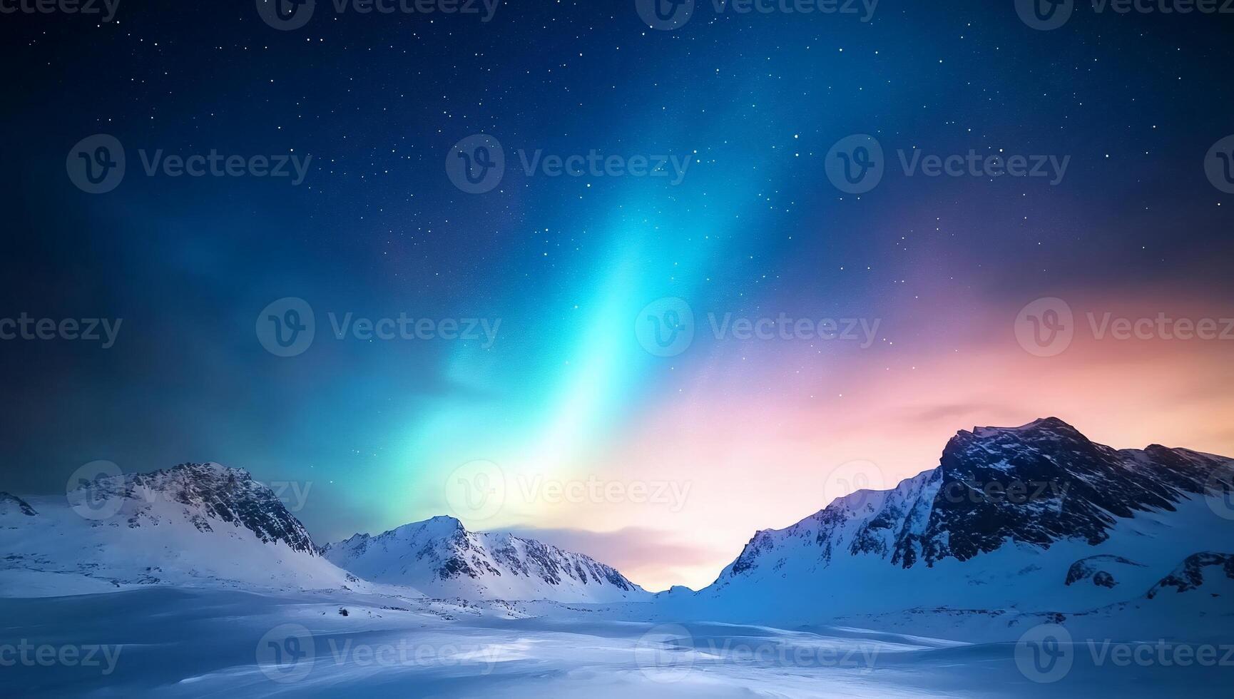 Stunning aurora borealis over snow-capped mountains at twilight. photo