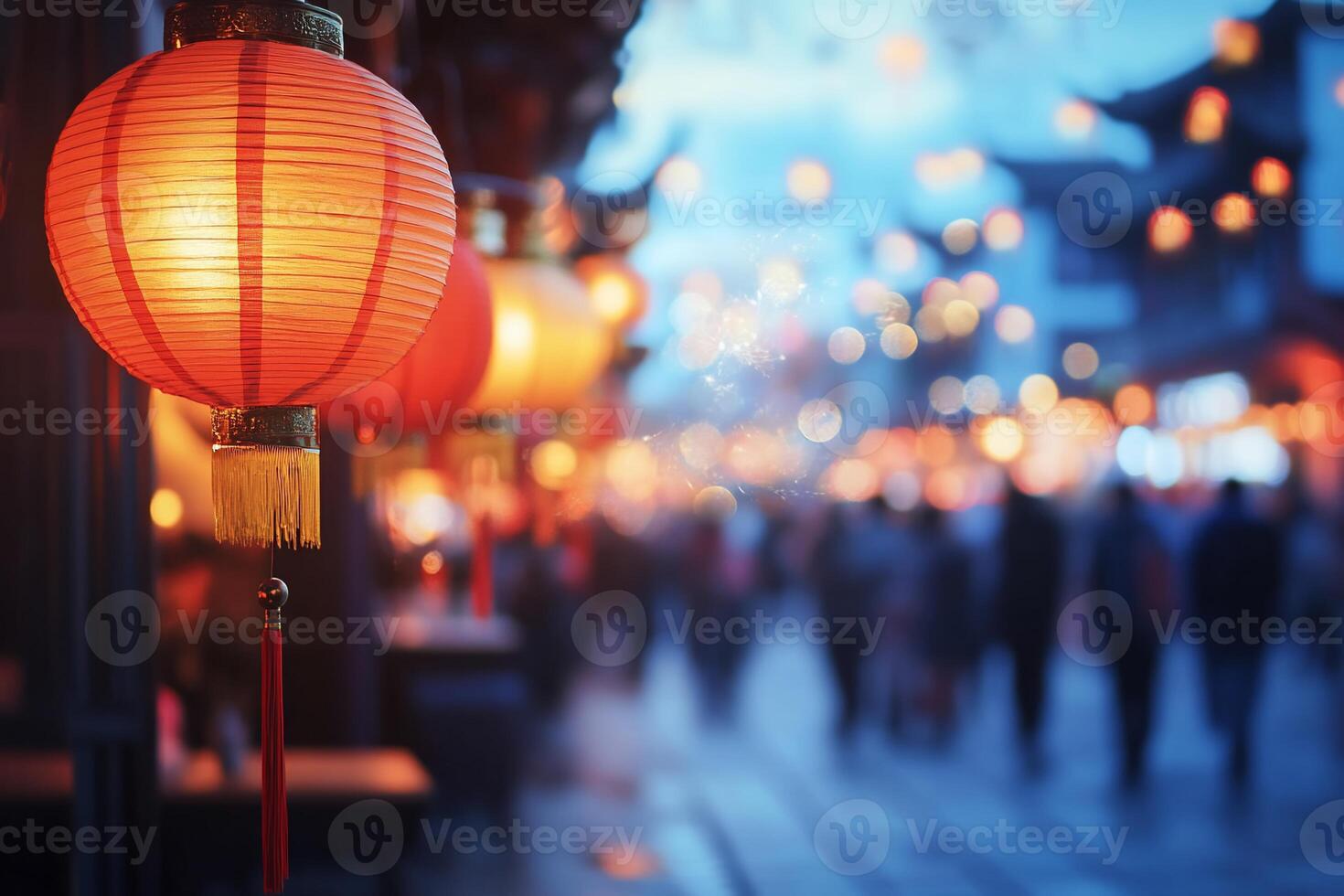 A vibrant street scene illuminated by traditional lanterns at dusk. photo
