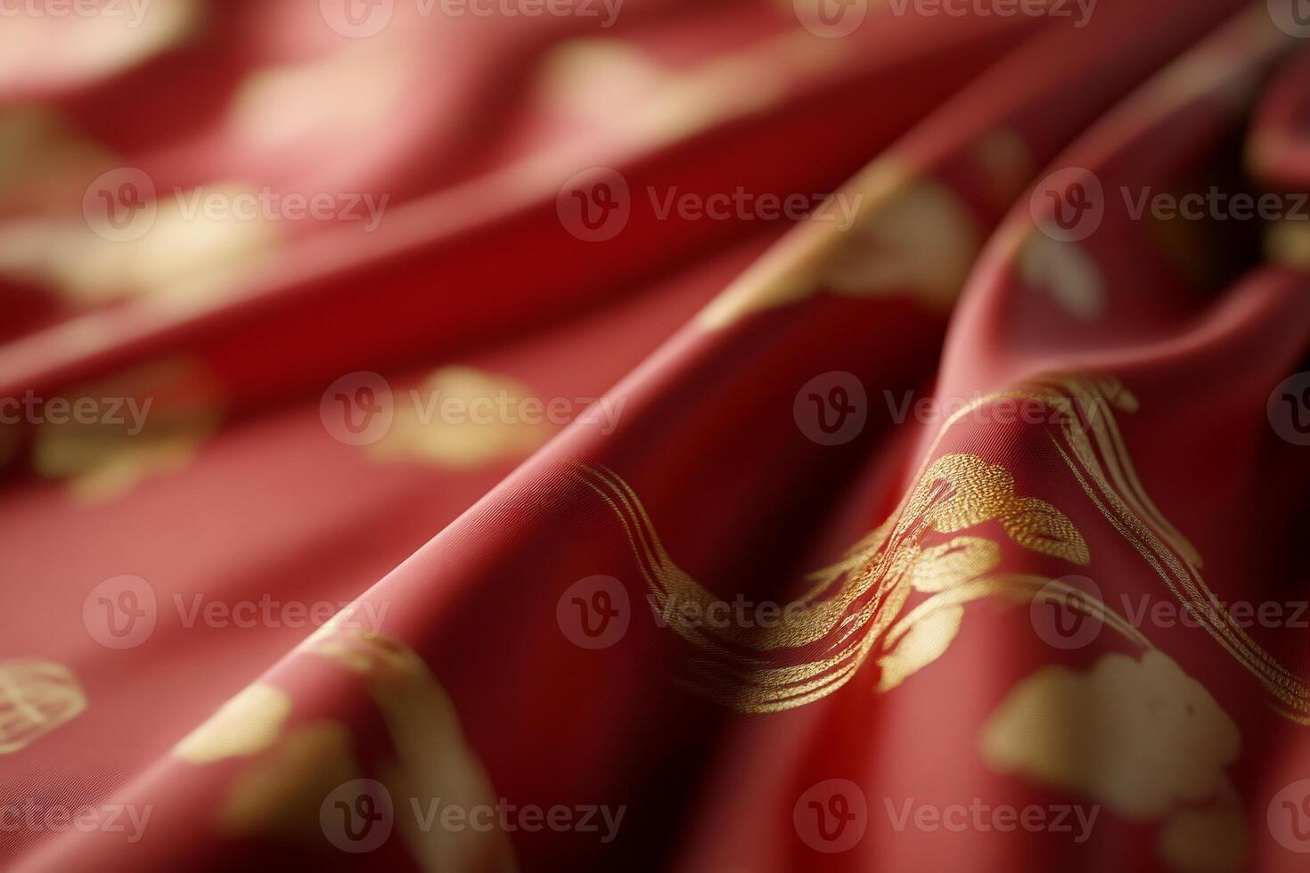 A close-up of rich red fabric adorned with golden patterns. photo
