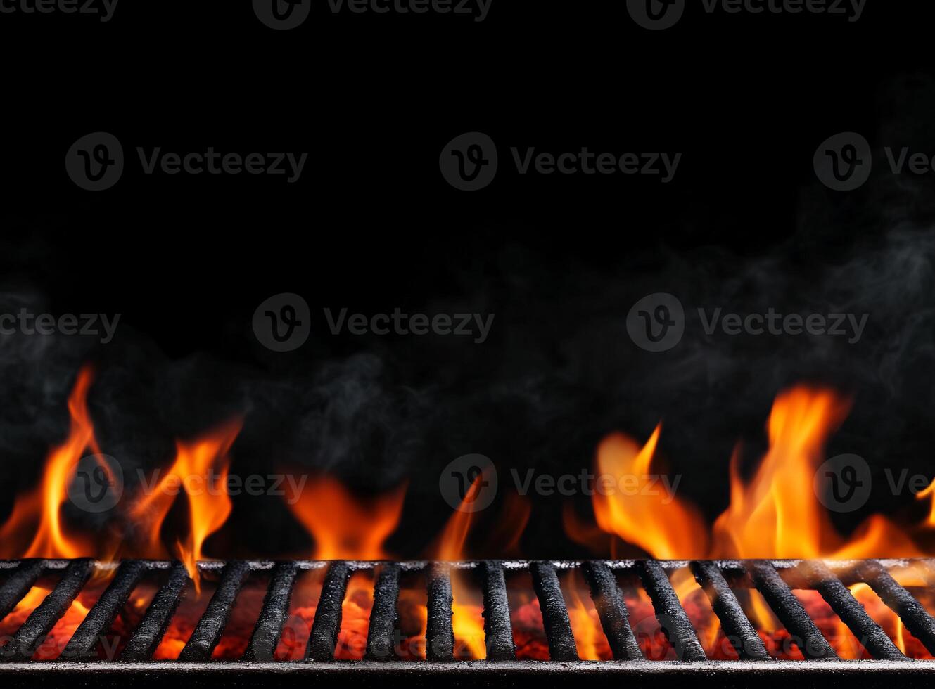 A fiery grill with flames and smoke, ideal for cooking food. photo