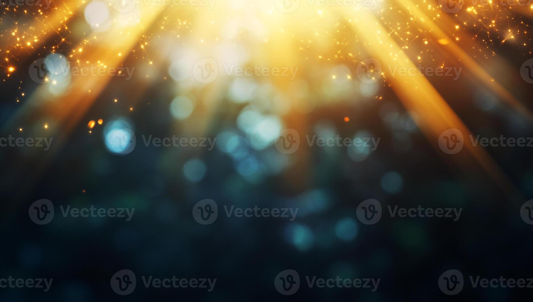 A glowing background with rays of light and sparkling bokeh effects. photo