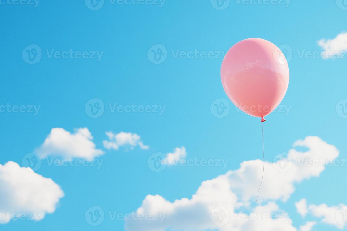 A pink balloon floats against a clear blue sky with fluffy clouds. photo