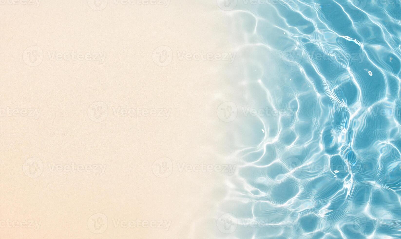 A serene blend of sandy beach and tranquil blue water. photo