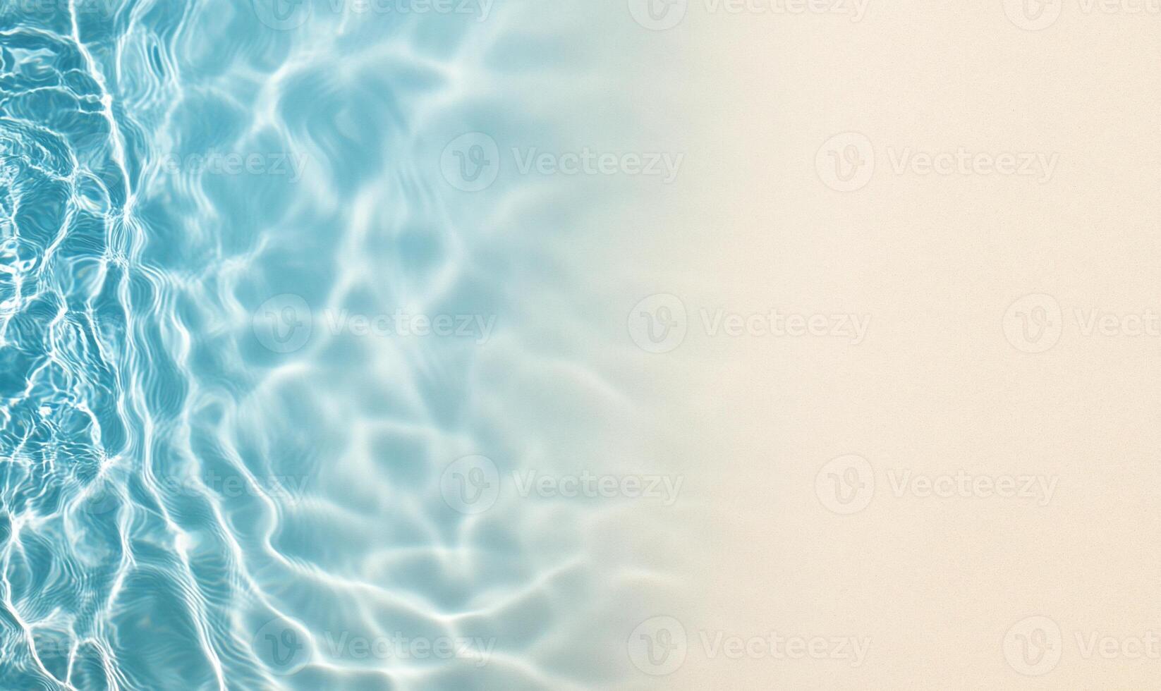 A serene blend of water and sandy texture, evoking tranquility. photo