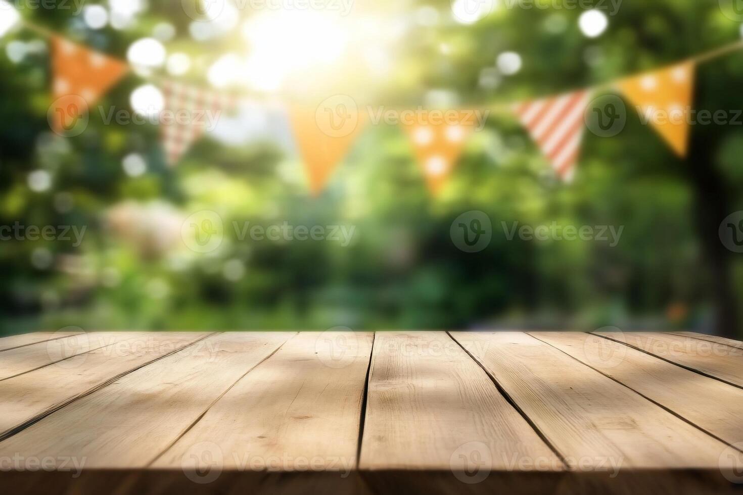 Empty wooden table with bunting flags in the background photo
