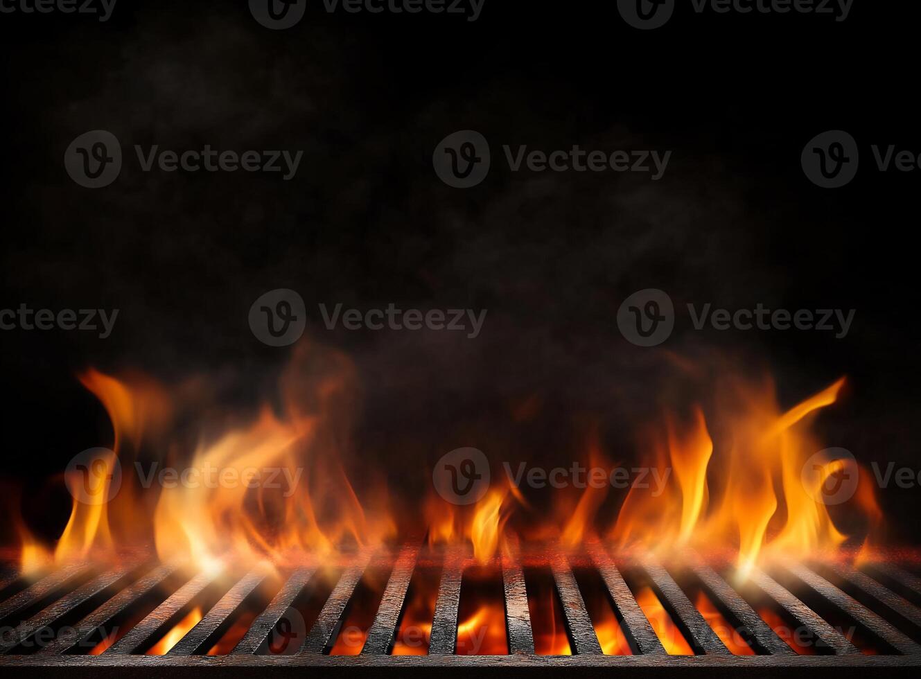 Flames rising from a grill against a dark background. photo