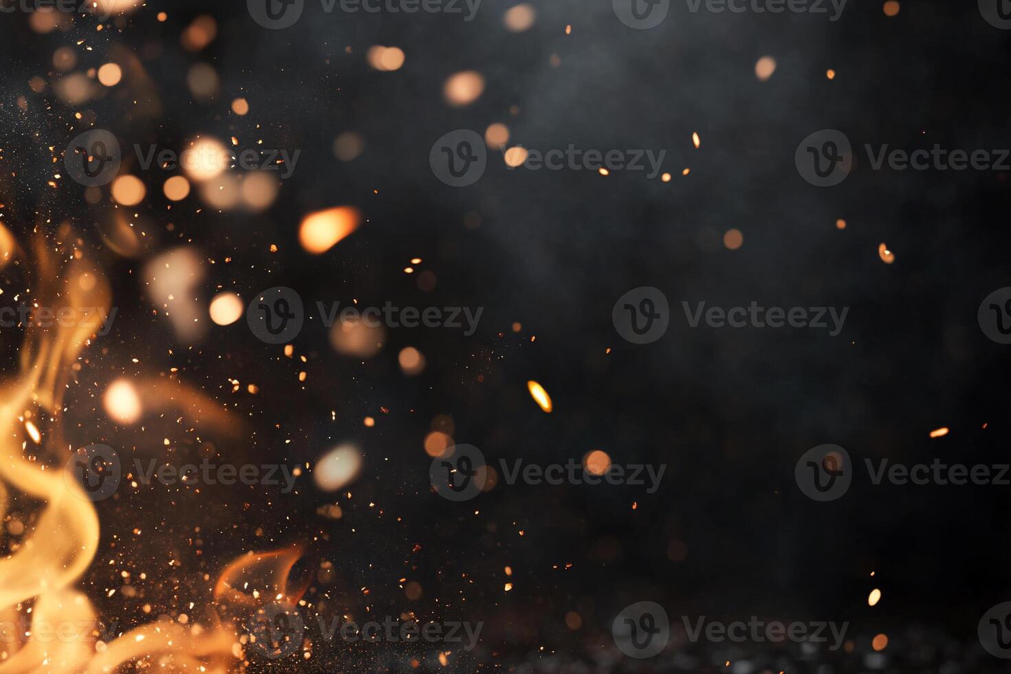 A dynamic image of flames and sparks against a dark background. photo