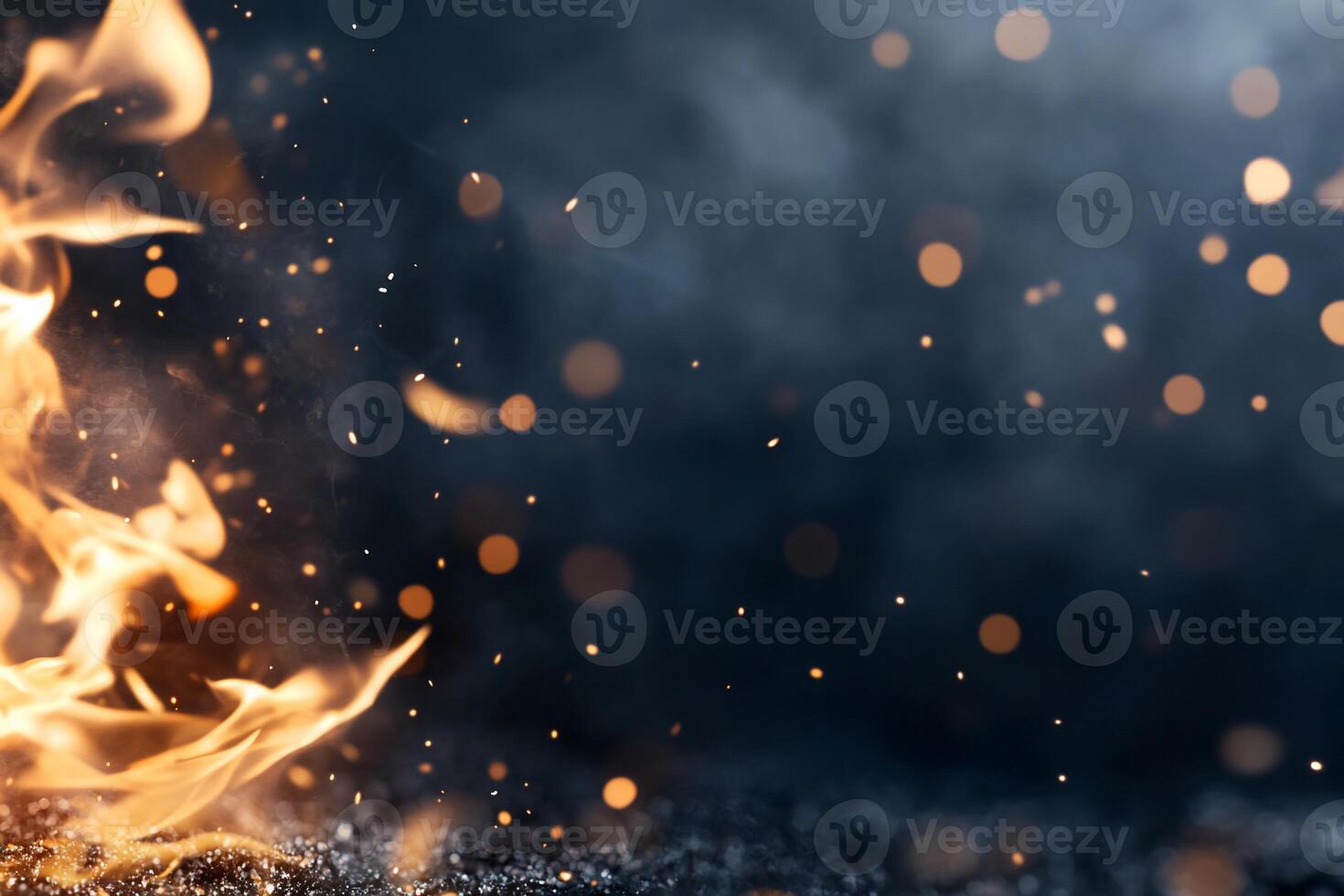 A close up of a fire with sparks flying photo