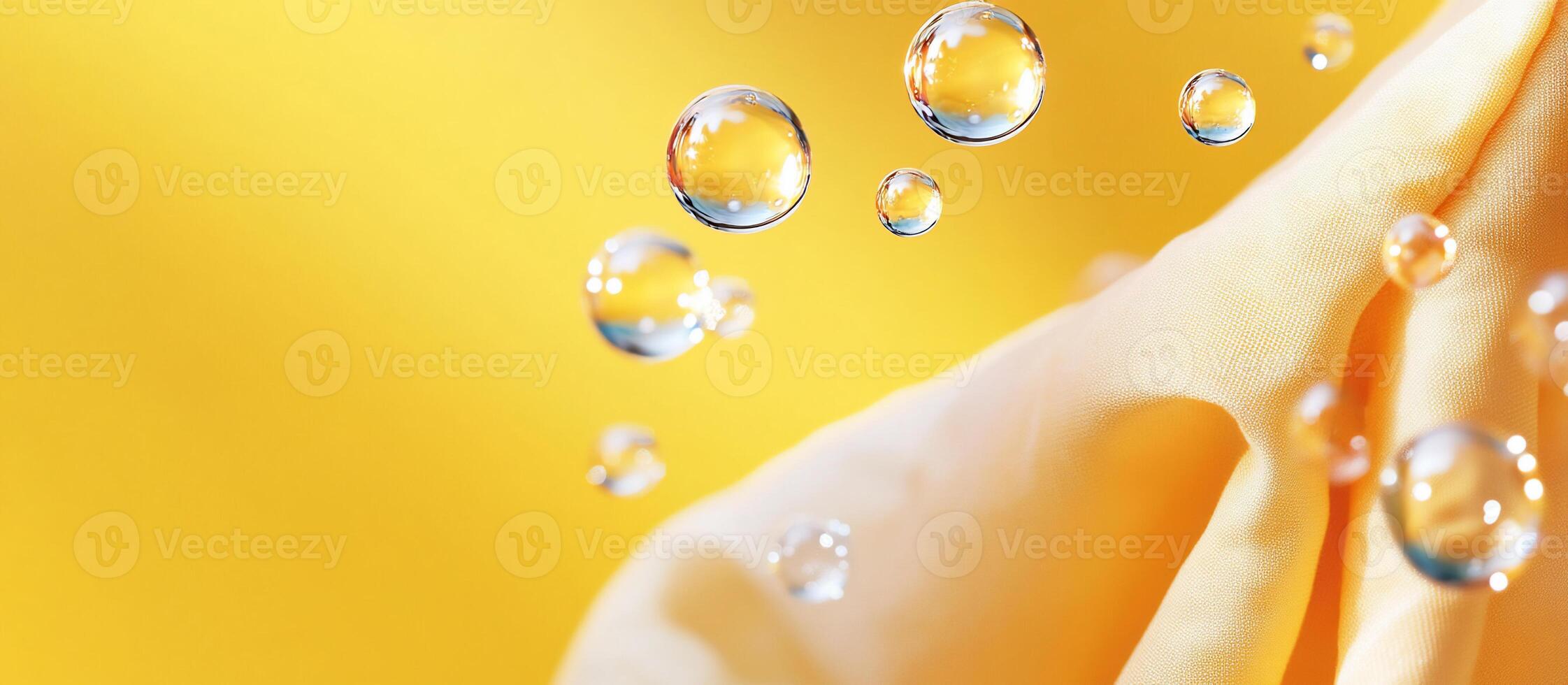Water droplets on yellow cloth photo