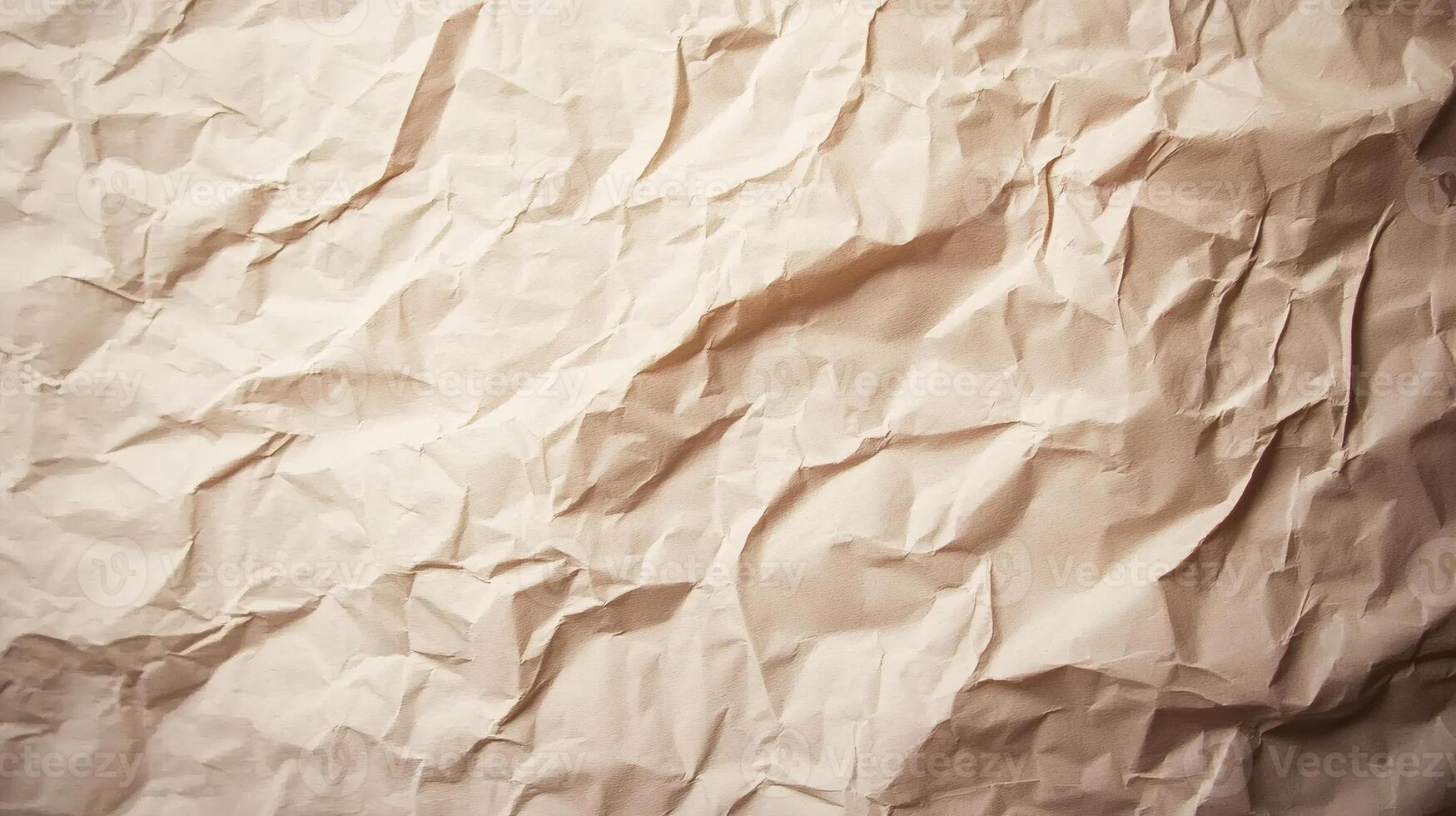 Crinkled Beige Paper Texture Close-up with Shadows and Light photo