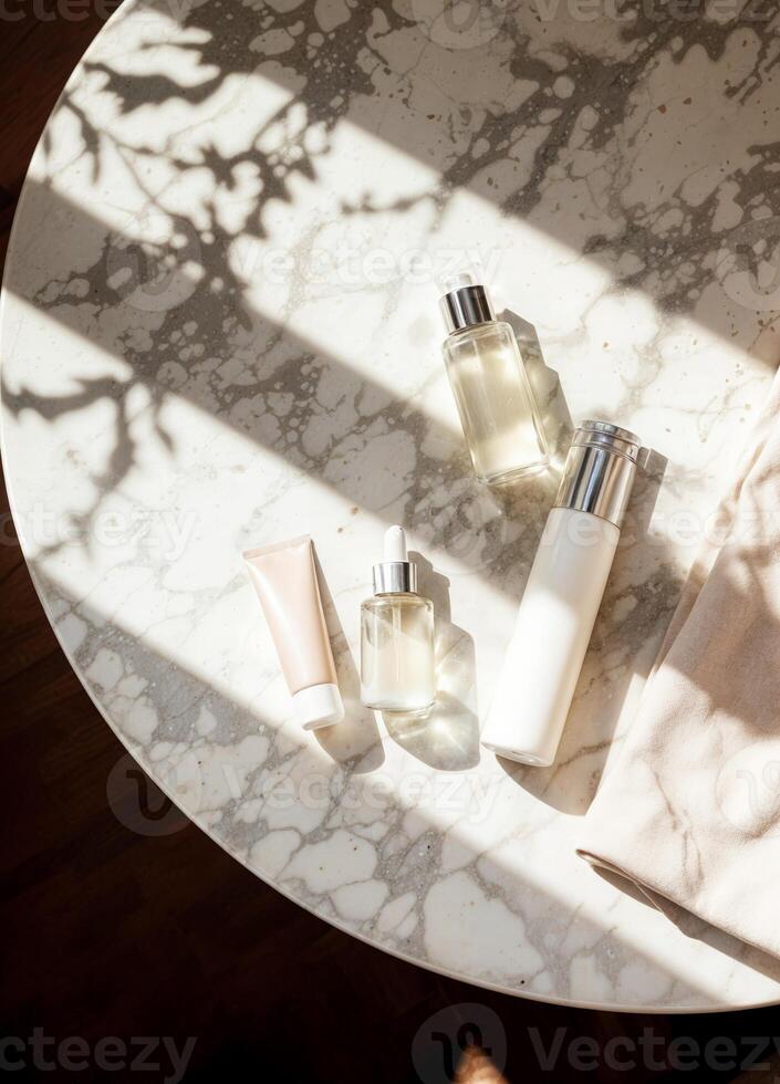 a marble table with bottles of skincare and a towel. Luxurious Skincare Set photo
