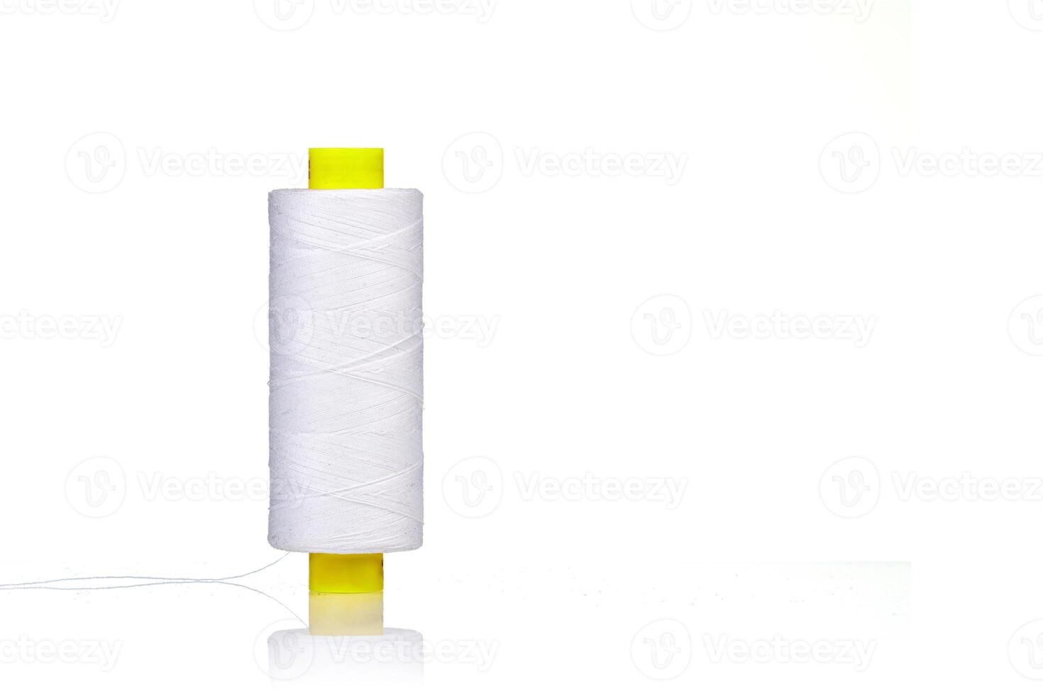 a skein of thread white colors macro on a close up white background photo