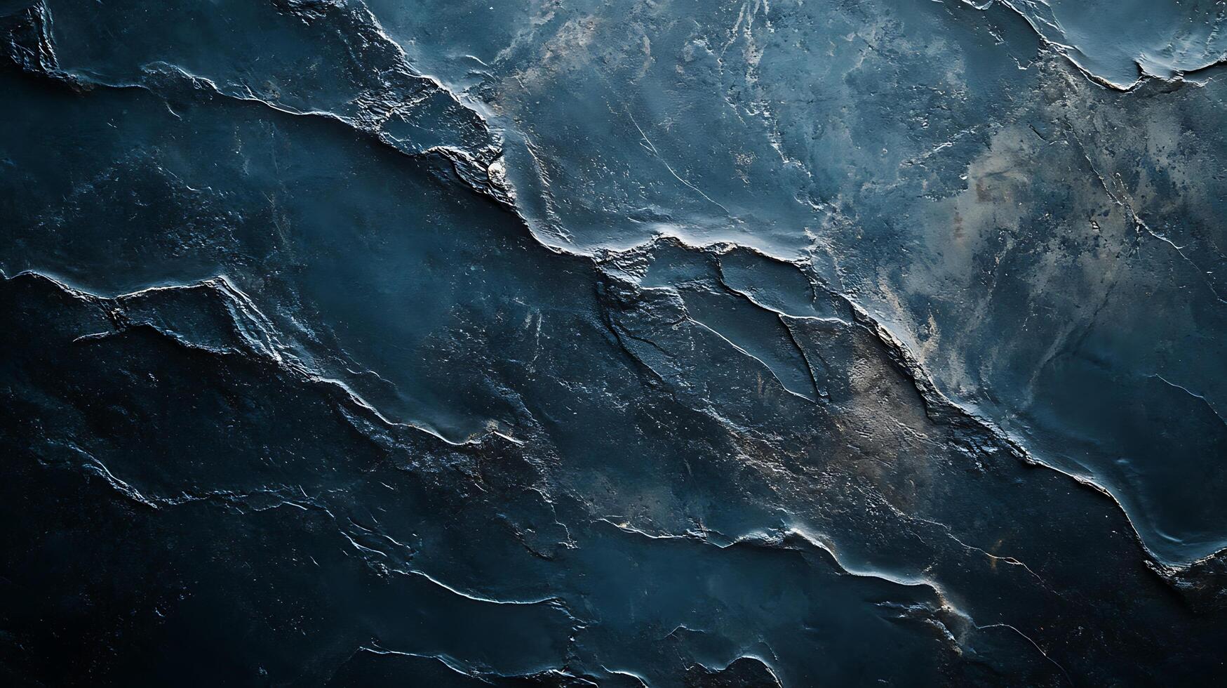 Abstract depiction of layered, dark textured stone. Detailed geological formation with sharp ridges, subtle gray highlights. photo