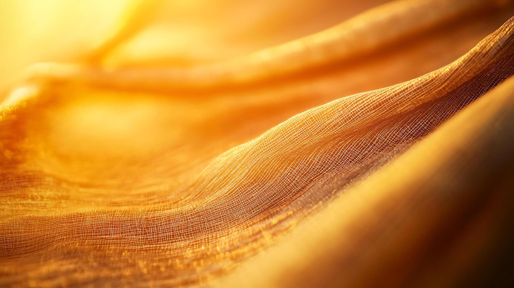 Abstract golden fabric with a warm glow creating gentle waves and subtle textures in this close-up view, ideal for artistic backgrounds. photo