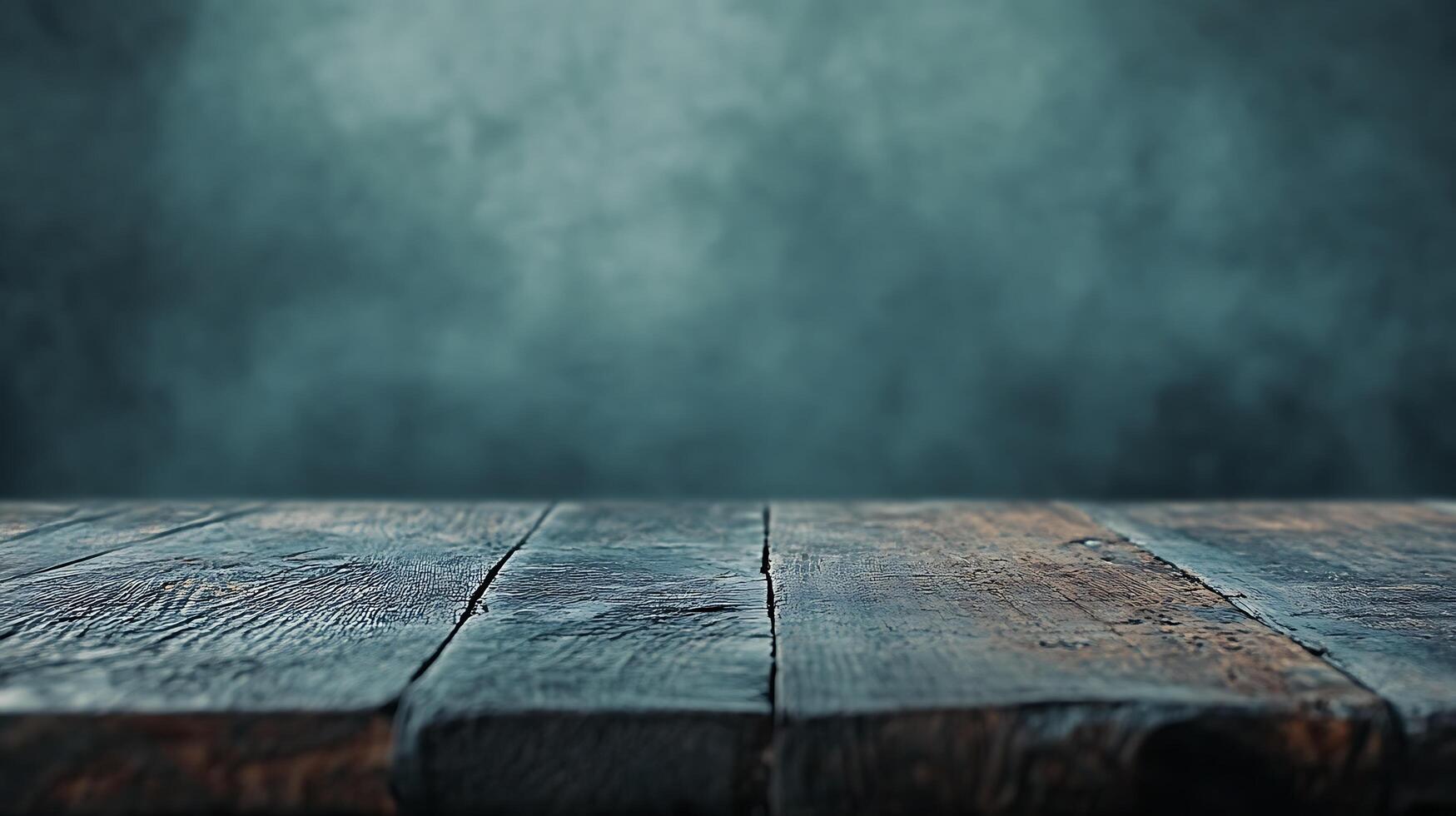Rustic wooden surface against blurred blue background. Texture of old boards creates vintage and moody atmosphere. Excellent for design. photo