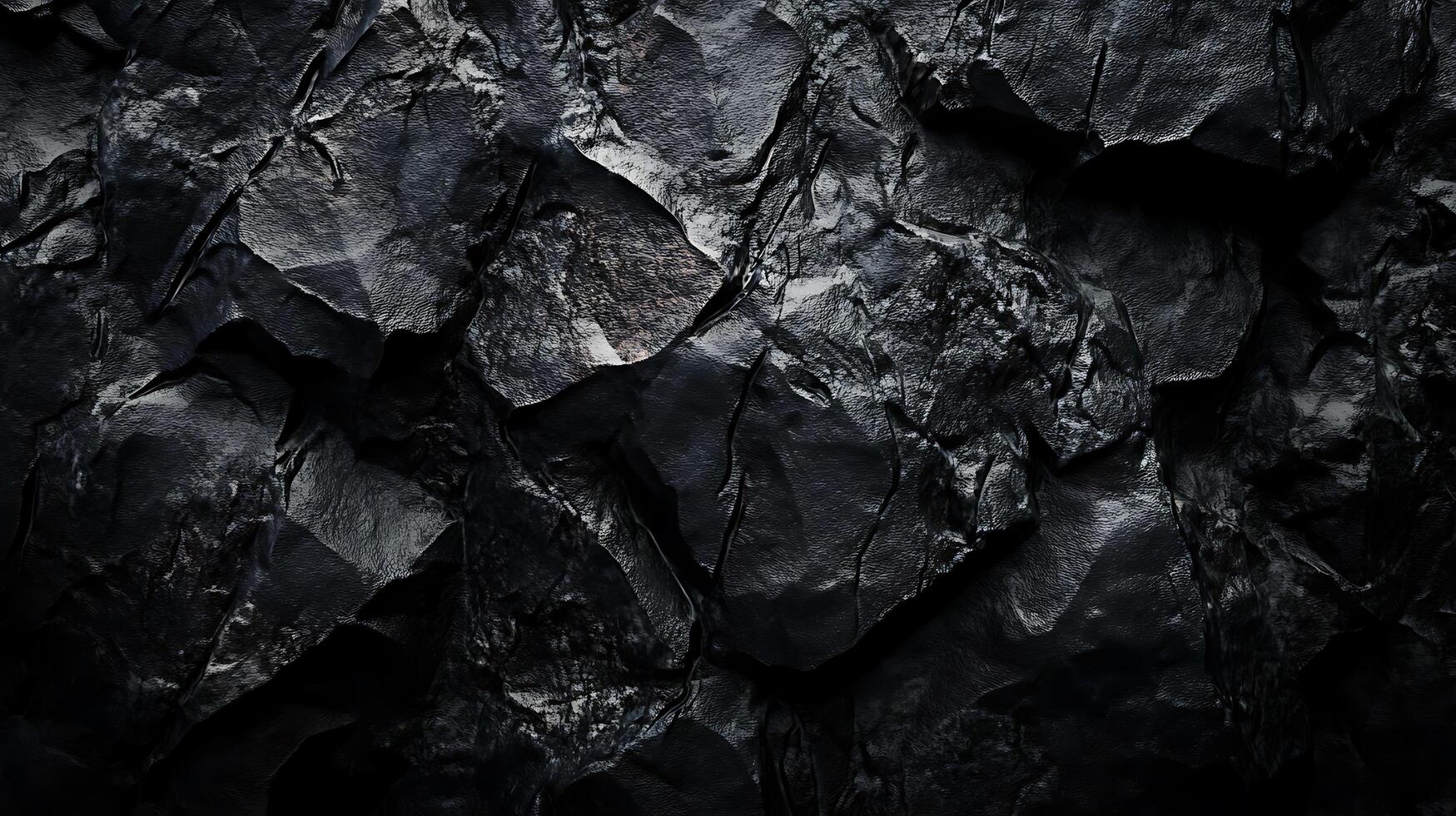 Textured background of black rock formations, shadows and dramatic light. Rugged, abstract nature and geological concept. photo