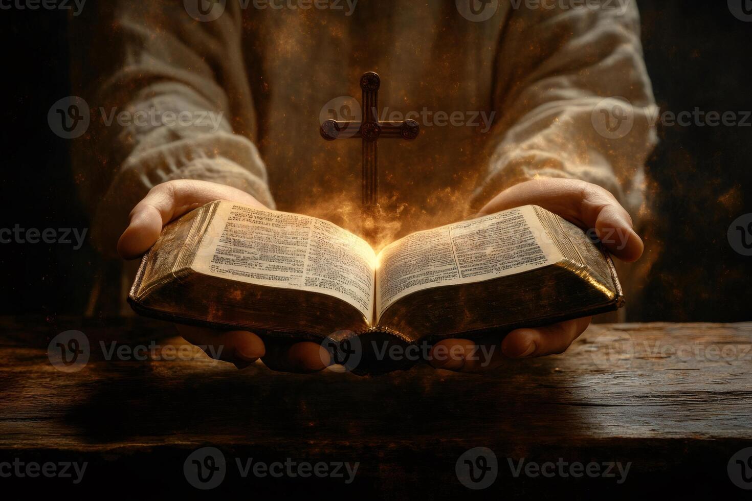 Monk holding holy bible with glowing cross and dust particles photo